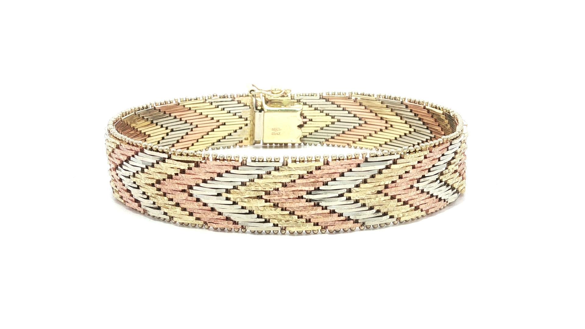 Material: Solid 14k Yellow, White & Rose Gold 
Weight: 35.4 Grams
Chain Type: Bark texture chevron link, flat strap bracelet
Chain Length: 7.25
