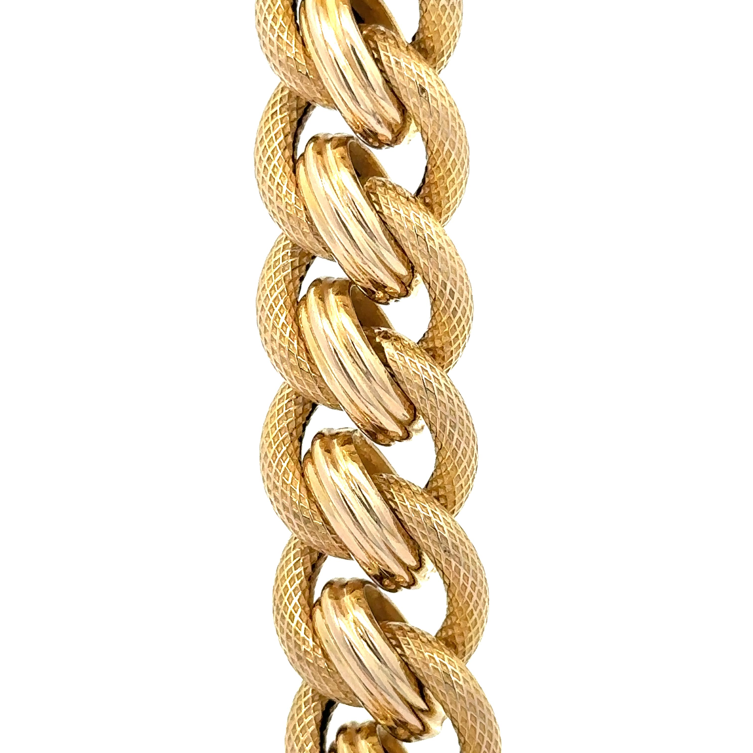 Material: Solid 14k Yellow Gold
Weight: 64.7 Grams
Chain Type: Interlocking Textured Cable & polished Link
Chain Length:	17 Inches (next to a ruler)
Chain Width: 15.2mm (approx.)
Clasp: Large Spring Ring
Condition: Excellent condition!
Stamp: