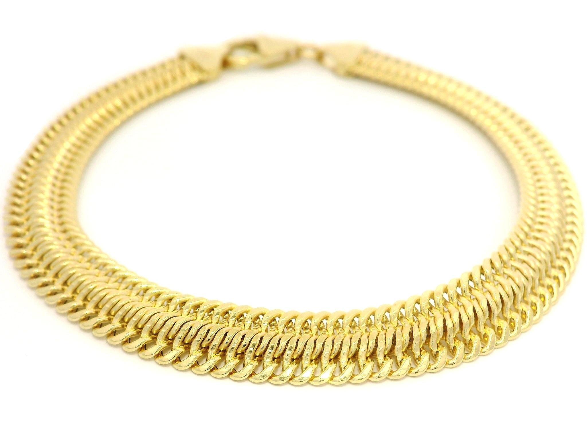 MATERIAL : Or jaune 14k massif
Poids : 6,4 grammes
Type de chaîne : Maillon serpent plat et flexible
Longueur de la chaîne : 7,25