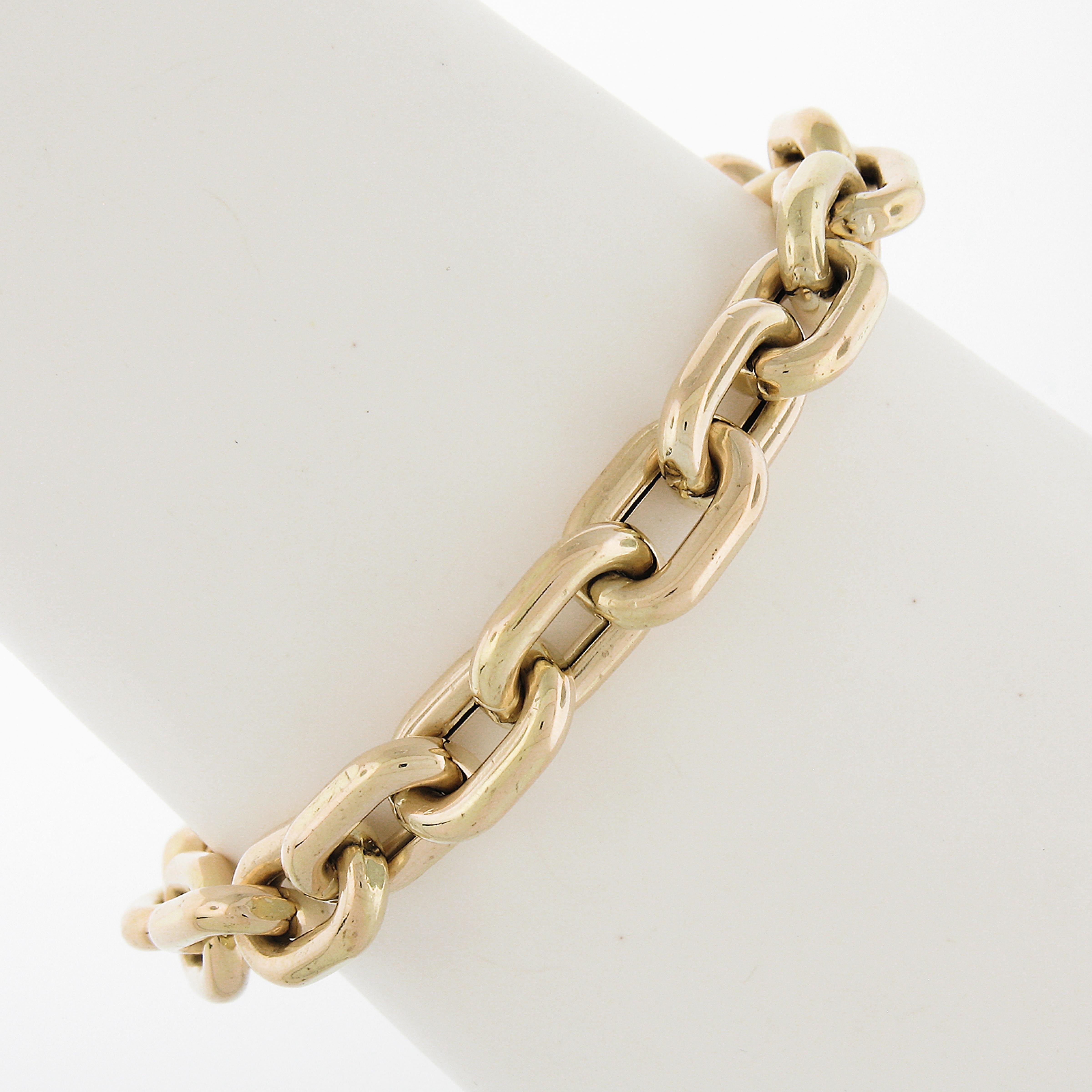 Material: Solid 14k Yellow Gold - Hollow Design
Weight: 20.72 Grams
Chain Type: Open Oval Links
Chain Length: Measures 7.5 Inches Next to a Ruler. Will Comfortably fit a 6.75 inch wrist (fitted on a wrist)
Clasp: Large Lobster Claw Clasp
Link Width: