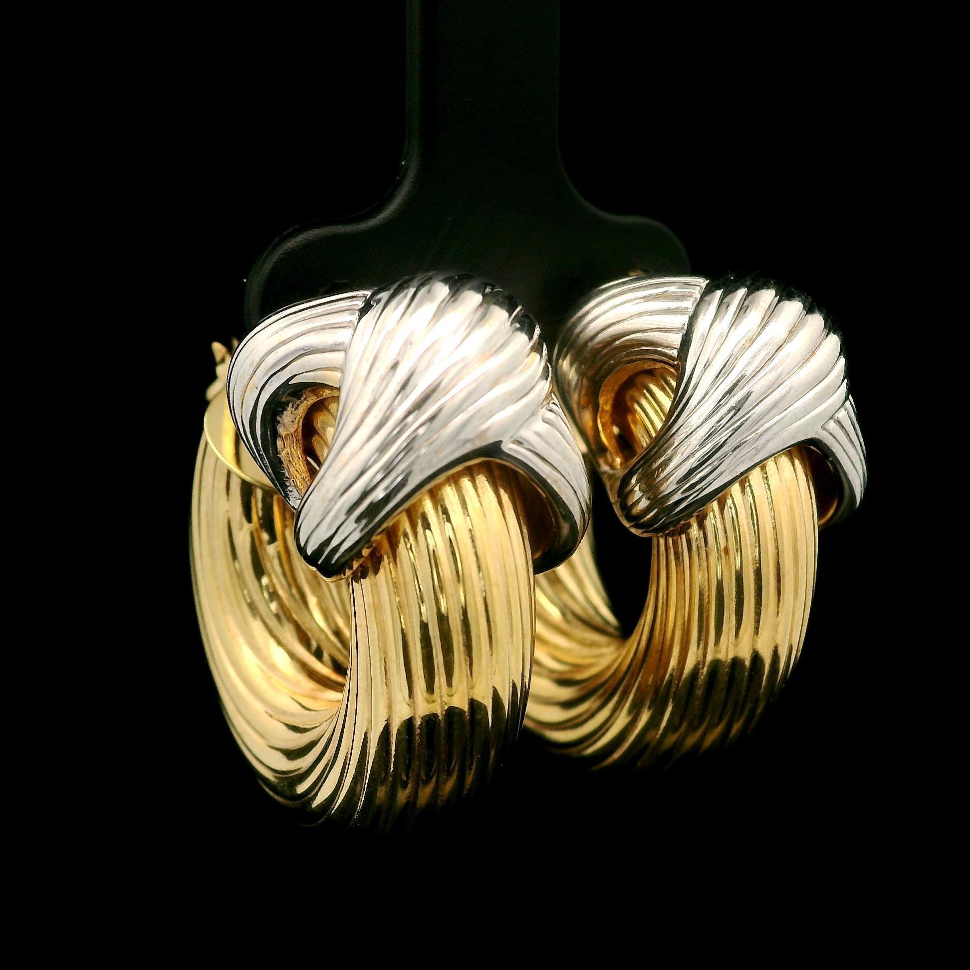 Material: 14K Solid Yellow Gold w/ White Gold Accents - Hollow Design - Solid Gold
Weight: 9.06 Grams
Backing: Posts w/ Secure Snap Closure (pierced ears are required)
Width: 29mm (1.1