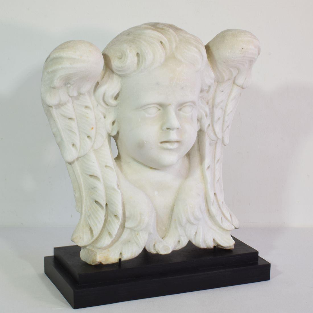 Baroque Italian, 17th / 18th Century Carved White Marble Winged Angel Head Ornament For Sale