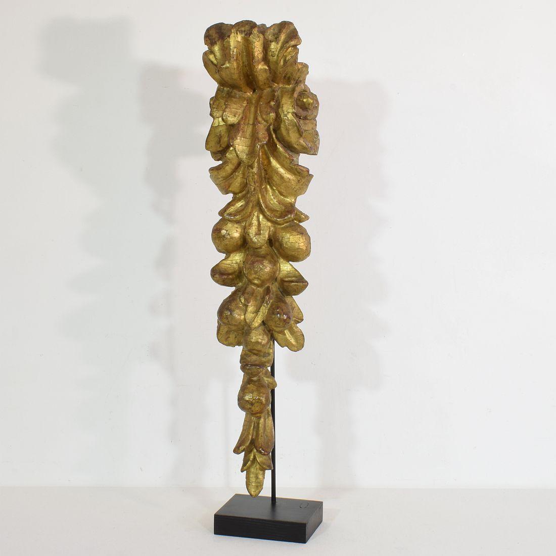 Beautiful carved giltwood baroque ornament. 
Italy, 17/18th century. Weathered and small losses.
Measurement includes the wooden base.