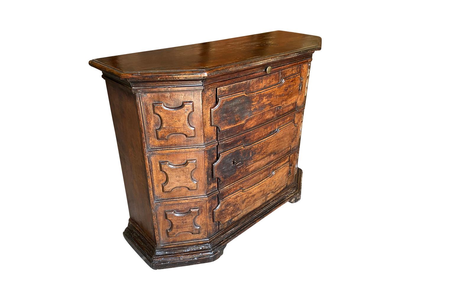 A very handsome 17th century Commode A Porte from Tuscany. Beautifully constructed in handsome walnut in the scantonata shape, a single drawer and a single door with interior shelving. A wonderful accent piece with stunning patina.