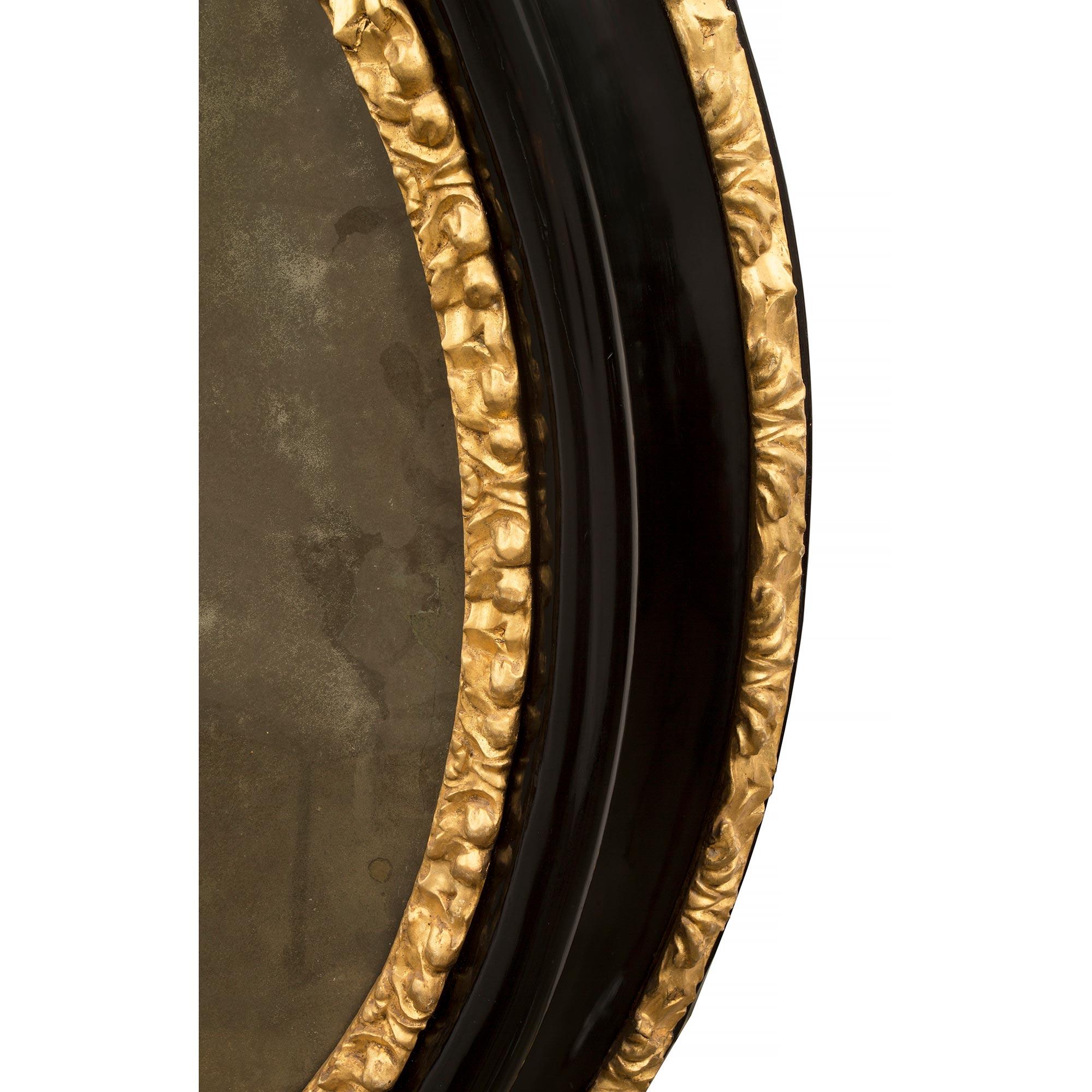 18th Century and Earlier Italian 17th Century Giltwood and Ebonized Fruitwood Florentine Mirror For Sale