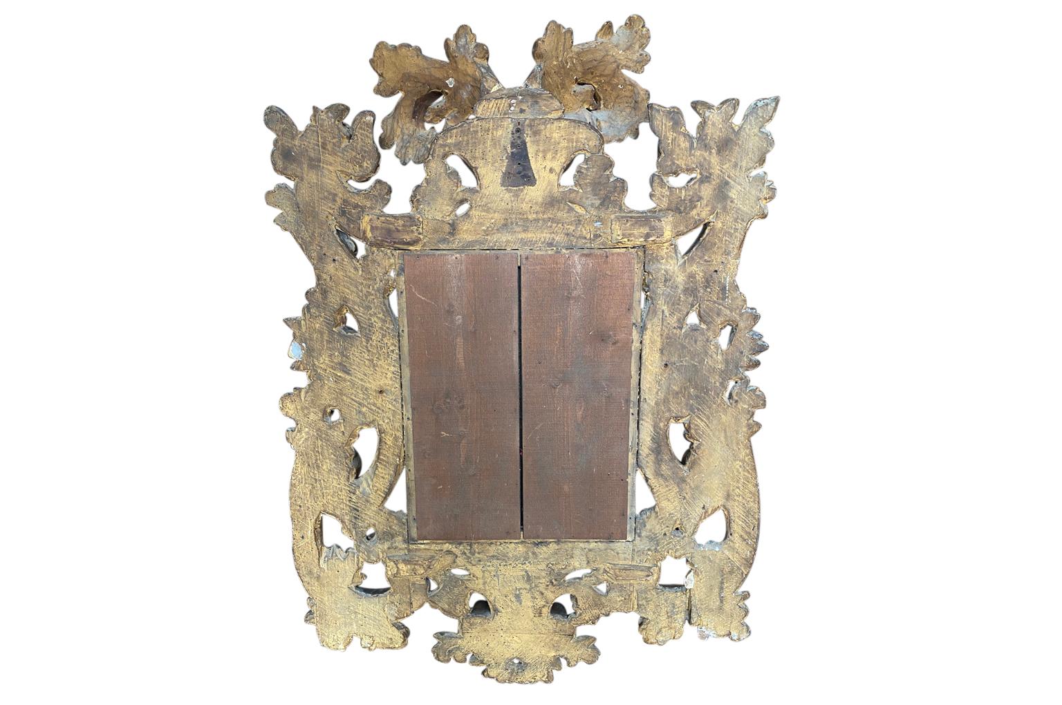 Miiror italien en bois doré du 17ème siècle en vente 9