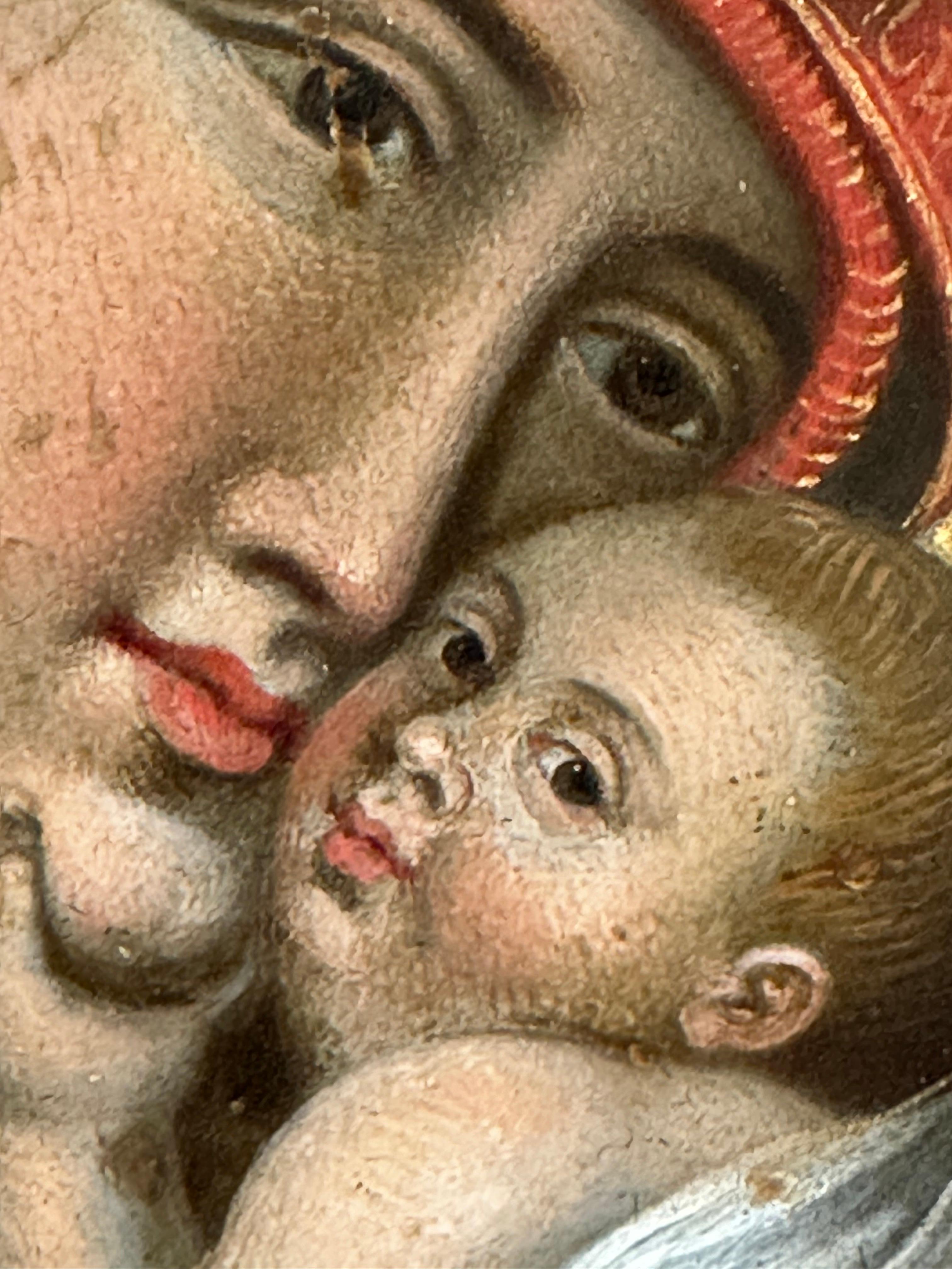 La Vierge Marie tenant l'enfant Jésus
Italie, XVIIe siècle
huile sur cuivre, dans le cadre du tabernacle
Encadré : 19 x 17 pouces
Panneau de cuivre actuel : 14.25 x 11 pouces 
Provenance : collection privée, France

Cette peinture est probablement