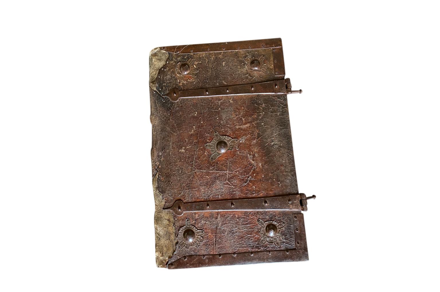 An exceptional 17th century Porte-Livre Précieux - Precious Book Carrier from the Piedmont region of Italy. Beautifully crafted from leather and iron. A wonderful accessory piece for any library or office.