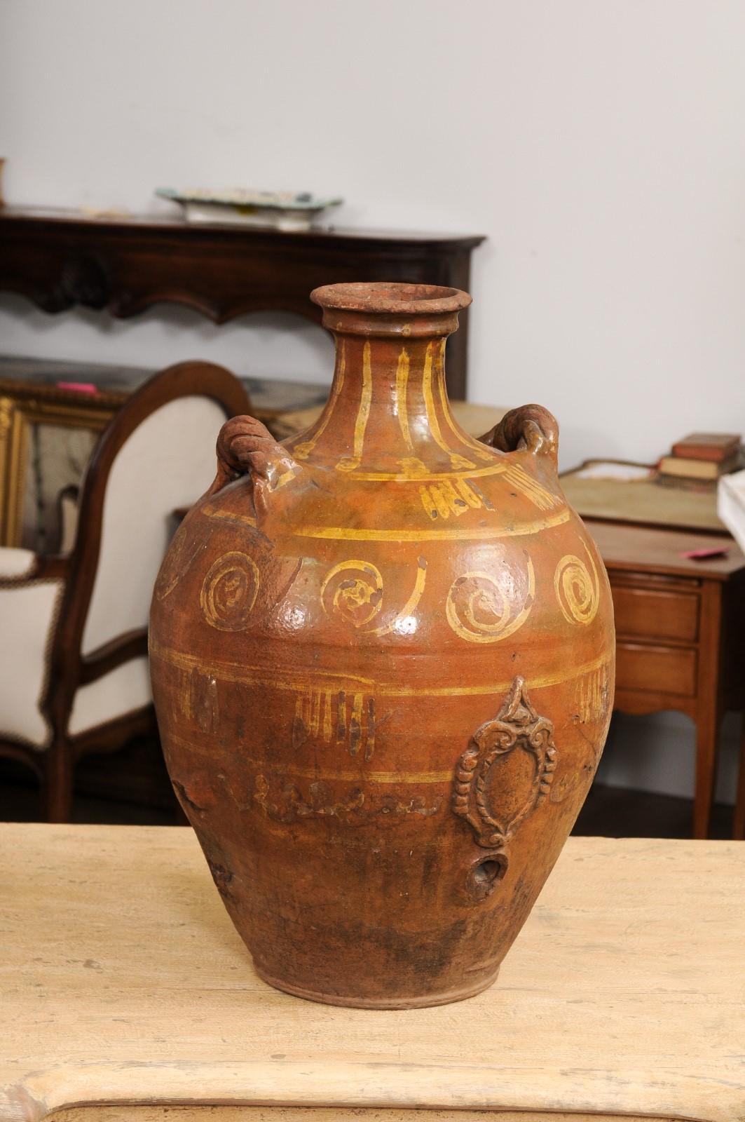 Italian 17th Century Terracotta Olive Oil Jar with Yellow Glazed Spiraling Décor In Good Condition For Sale In Atlanta, GA