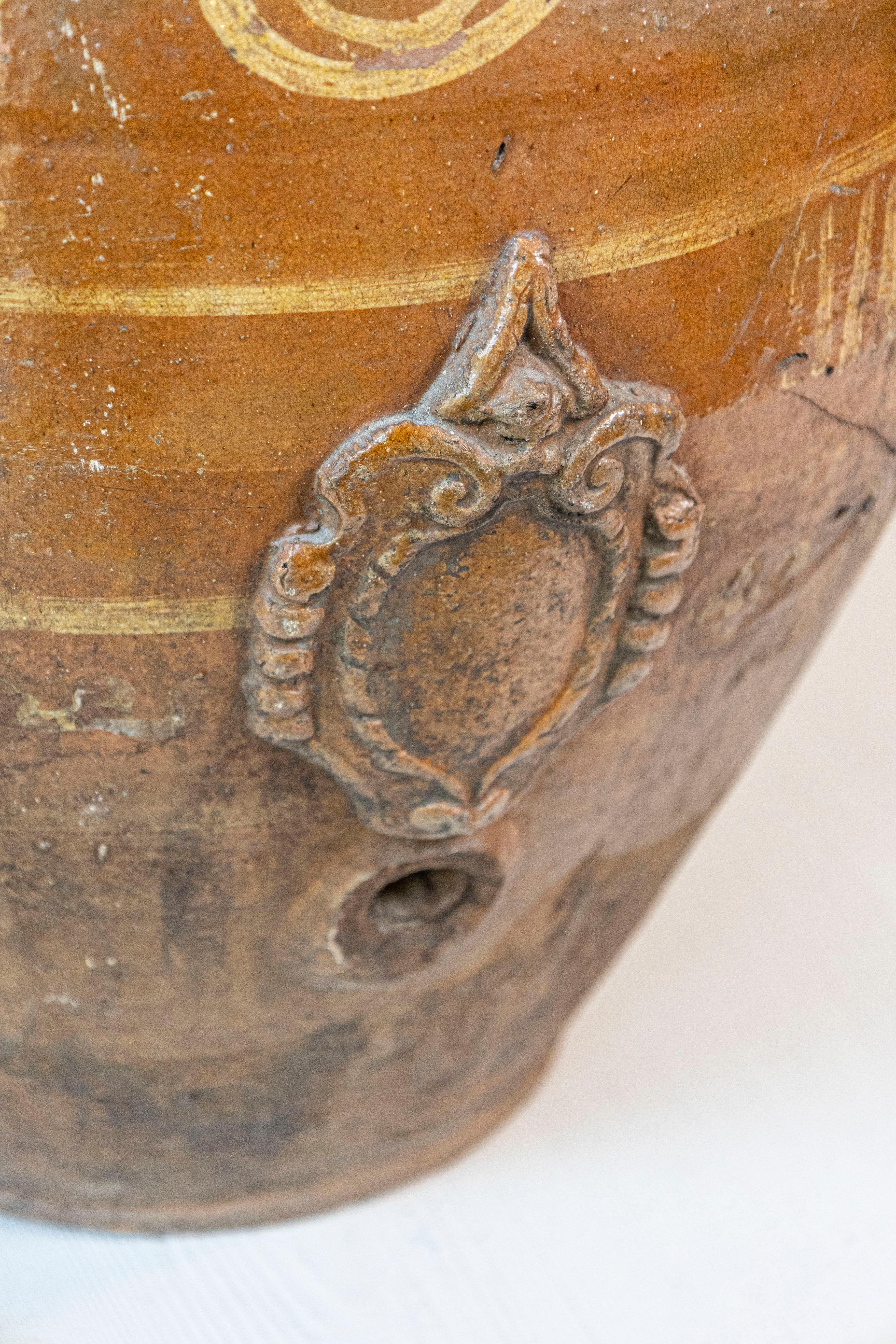 Italian 17th Century Terracotta Olive Oil Jar with Yellow Glazed Spiraling Décor In Good Condition For Sale In Atlanta, GA