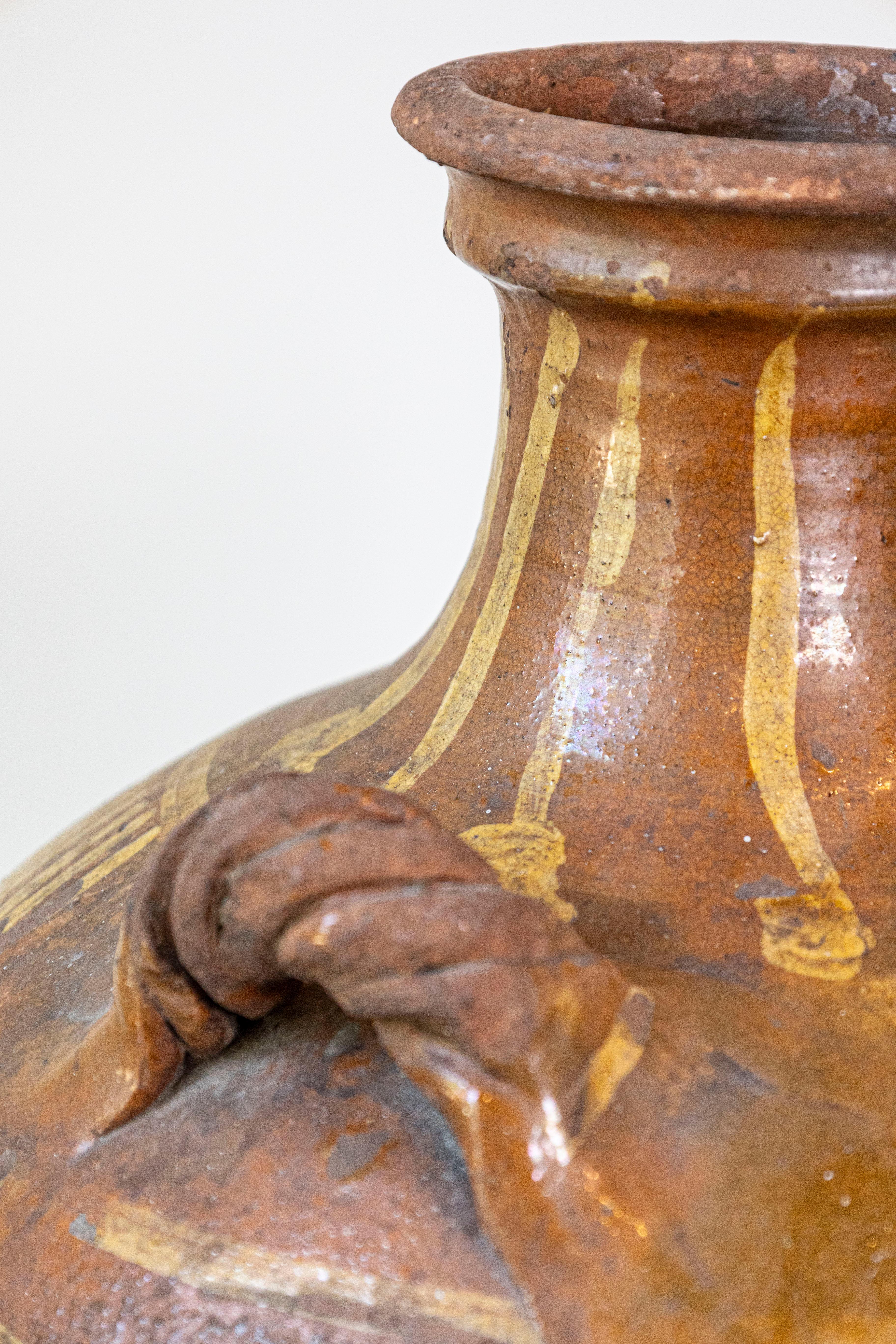 18th Century and Earlier Italian 17th Century Terracotta Olive Oil Jar with Yellow Glazed Spiraling Décor For Sale