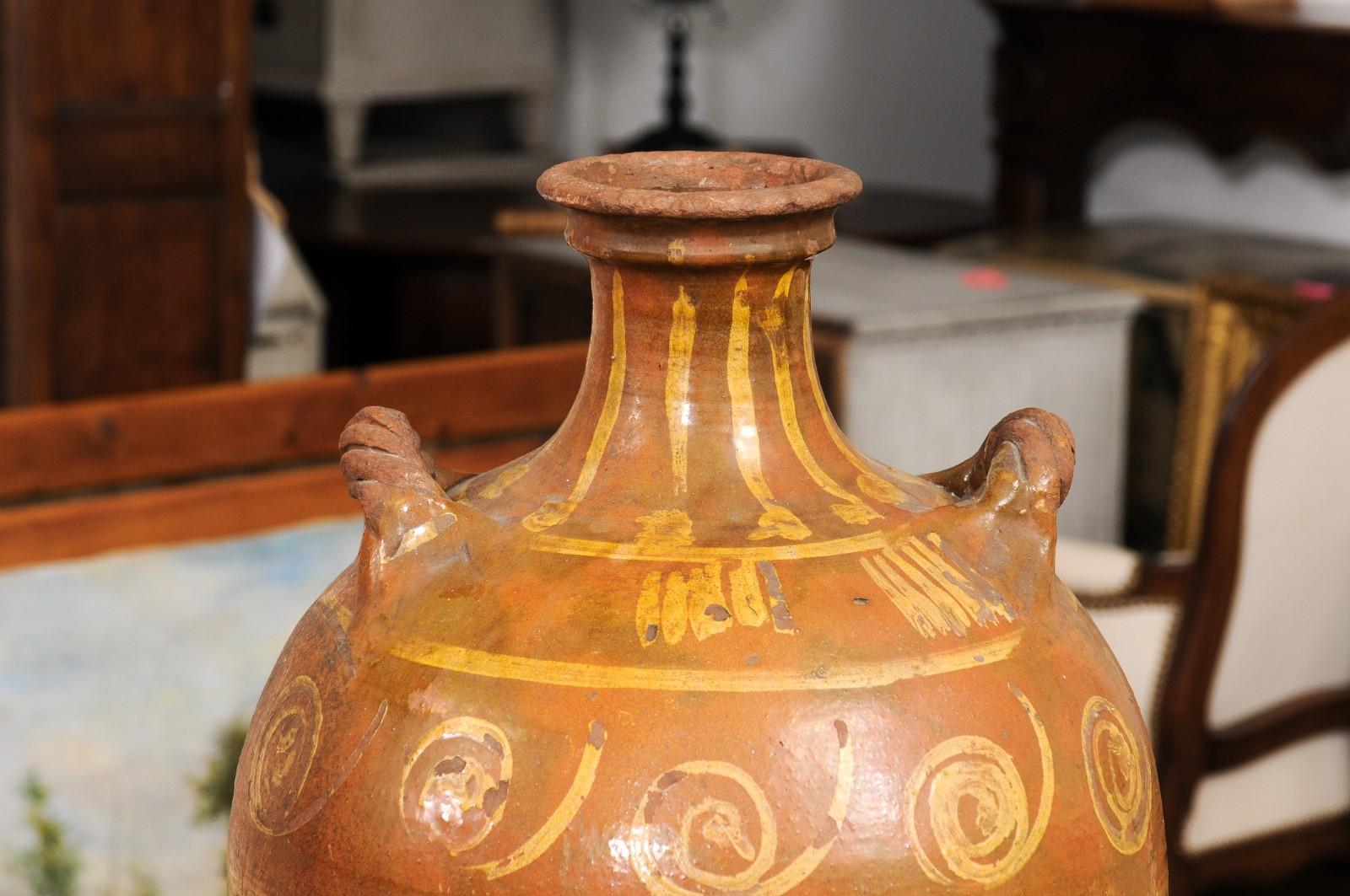 Italian 17th Century Terracotta Olive Oil Jar with Yellow Glazed Spiraling Décor For Sale 1