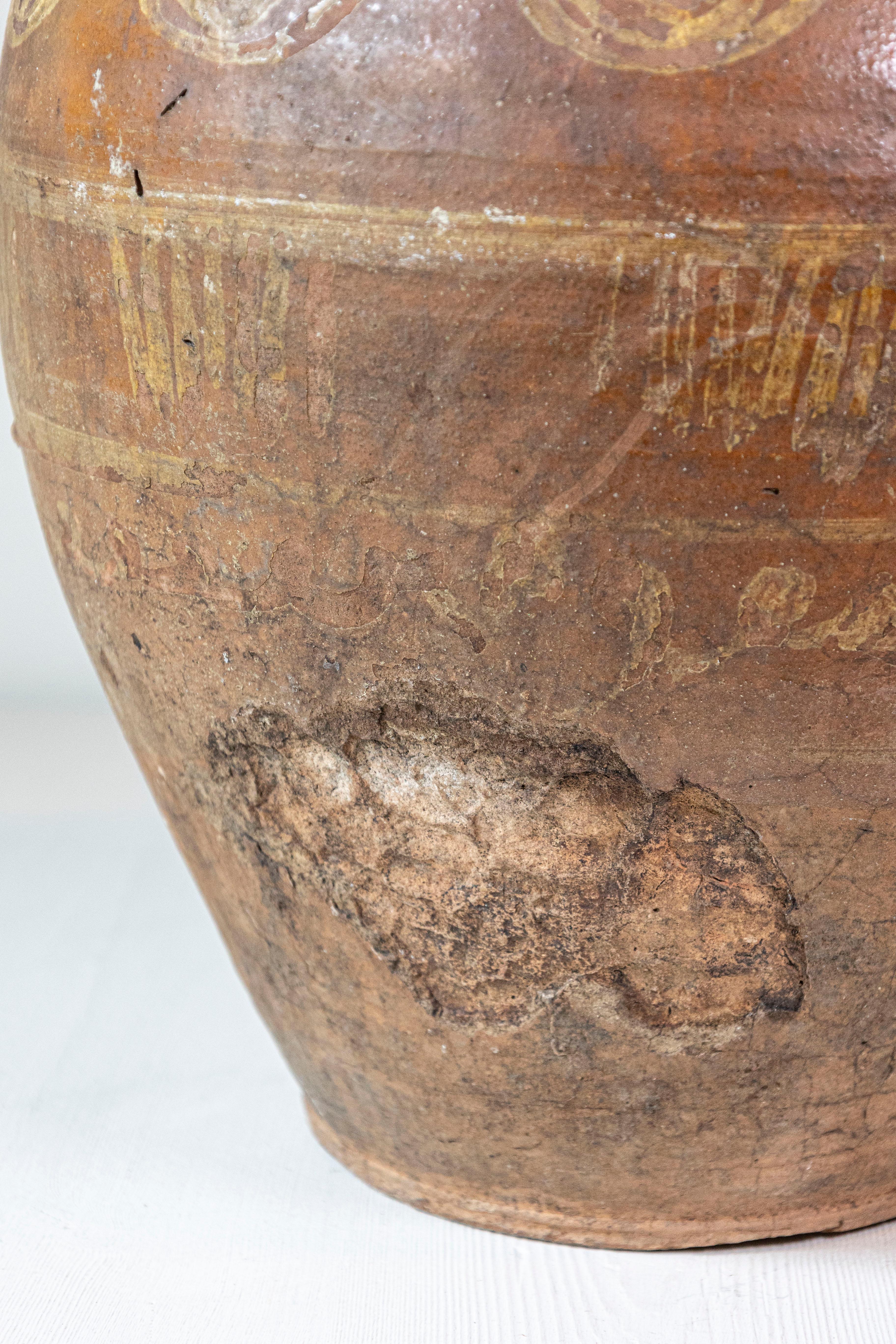 Italian 17th Century Terracotta Olive Oil Jar with Yellow Glazed Spiraling Décor For Sale 4