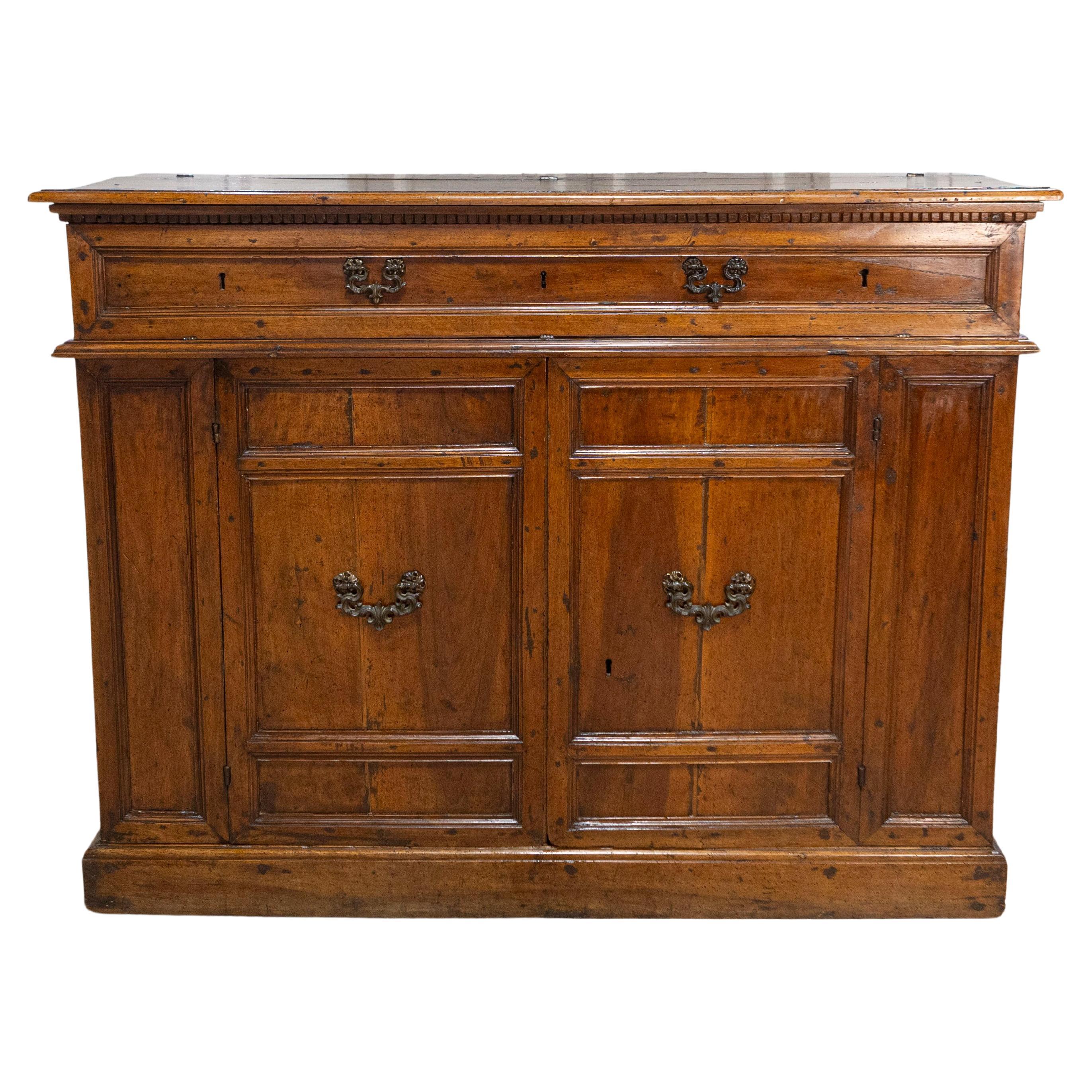 Italian 17th Century Walnut Buffet with Drop Front, Hidden Drawers and Two Doors