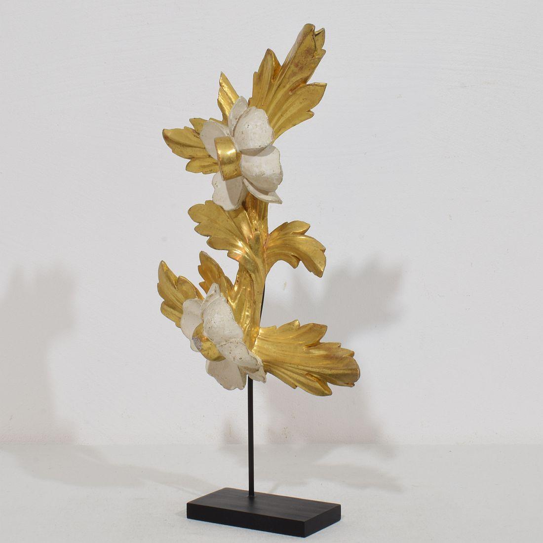 Beautiful handcarved giltwood floral ornament that once adorned a chapel .Original period piece that due it’s high age has a wonderful weathered look.
Italy circa 1780/1850 , weathered,small losses 
Measurements include the wooden base.
H:35cm 