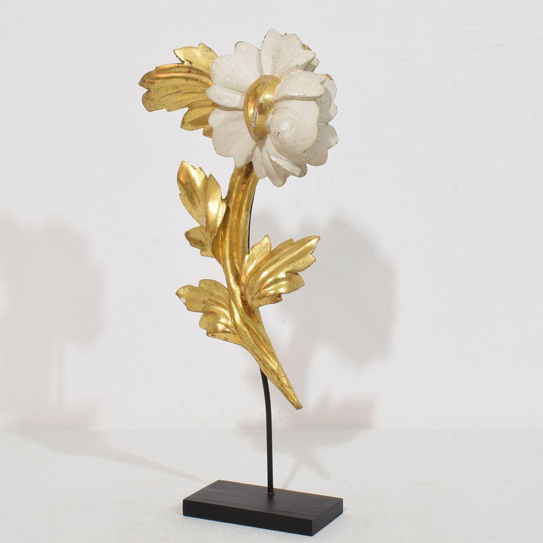Beautiful handcarved giltwood floral ornament that once adorned a chapel .Original period piece that due it’s  high age has  a wonderful weathered look.
Italy circa 1780/1850 , weathered
Measurements include the wooden base.
H:33cm  W:17cm D:7cm 
