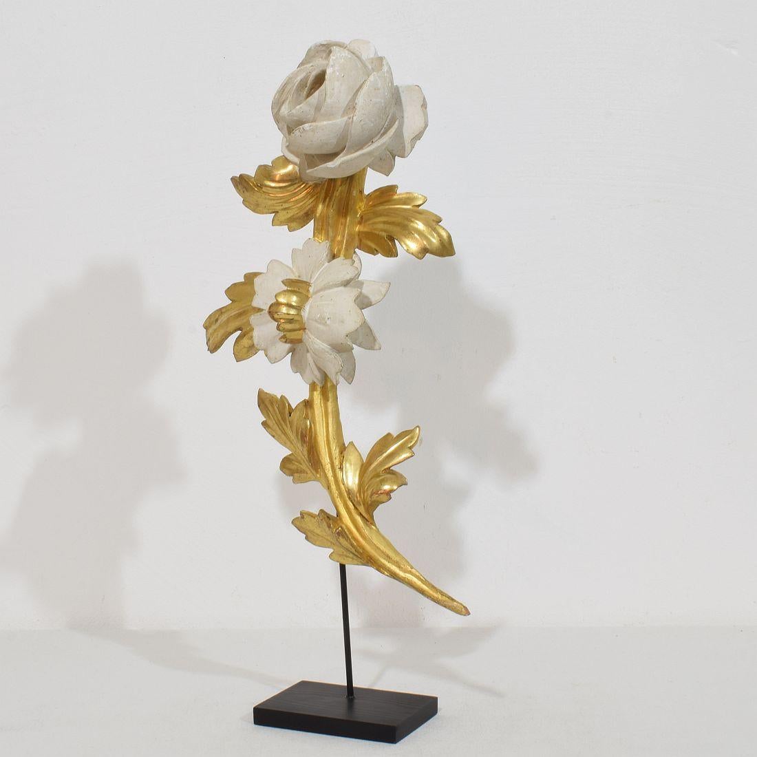 Beautiful handcarved giltwood floral ornament that once adorned a chapel .Original period piece that due it’s high age has a wonderful weathered look.
Italy circa 1780/1850 , weathered
Measurements include the wooden base.
H:43cm  W:20cm D:8cm 
