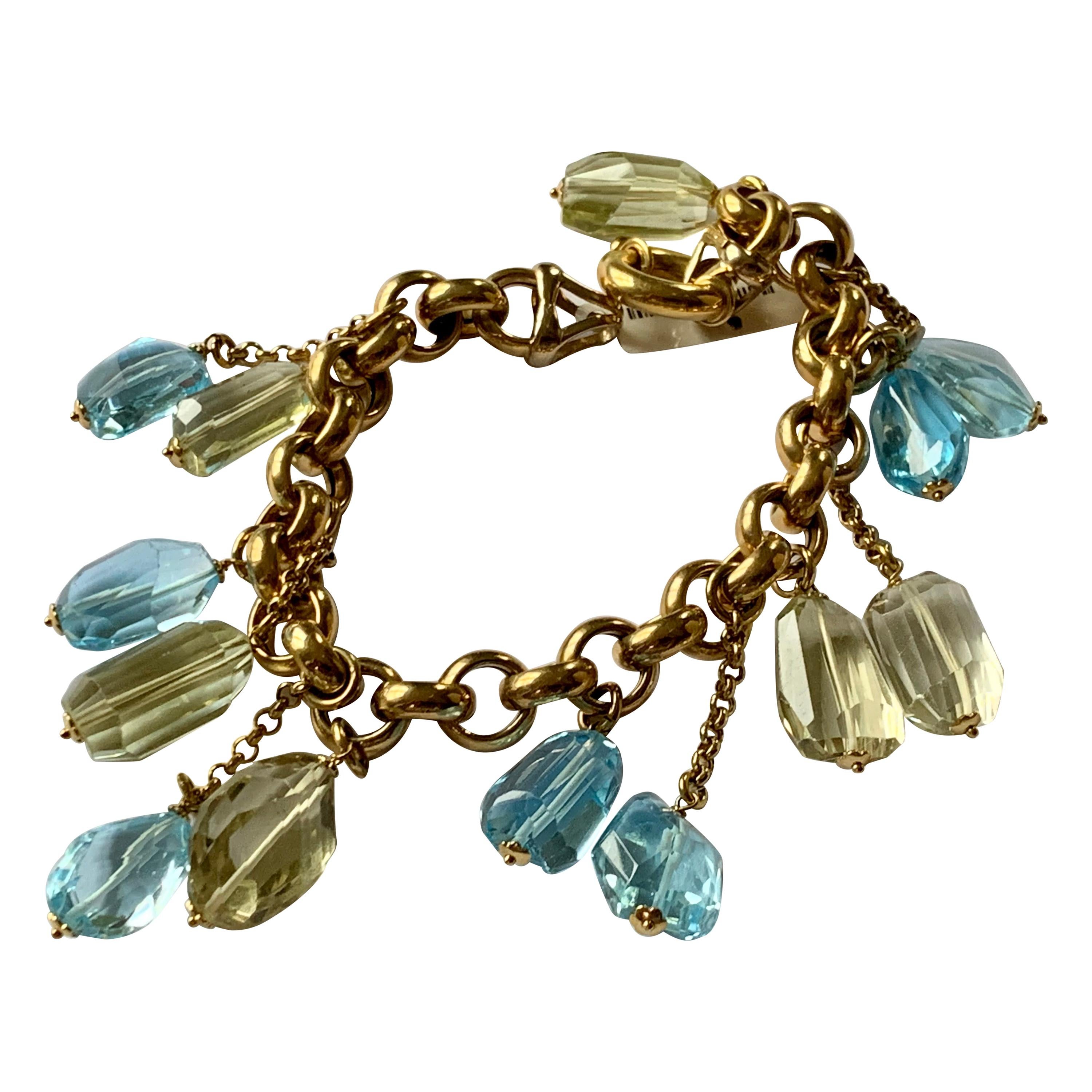 Italian 18 K Yellow Gold Charm Bracelet Blue Topaz an Lemon Citrines For Sale