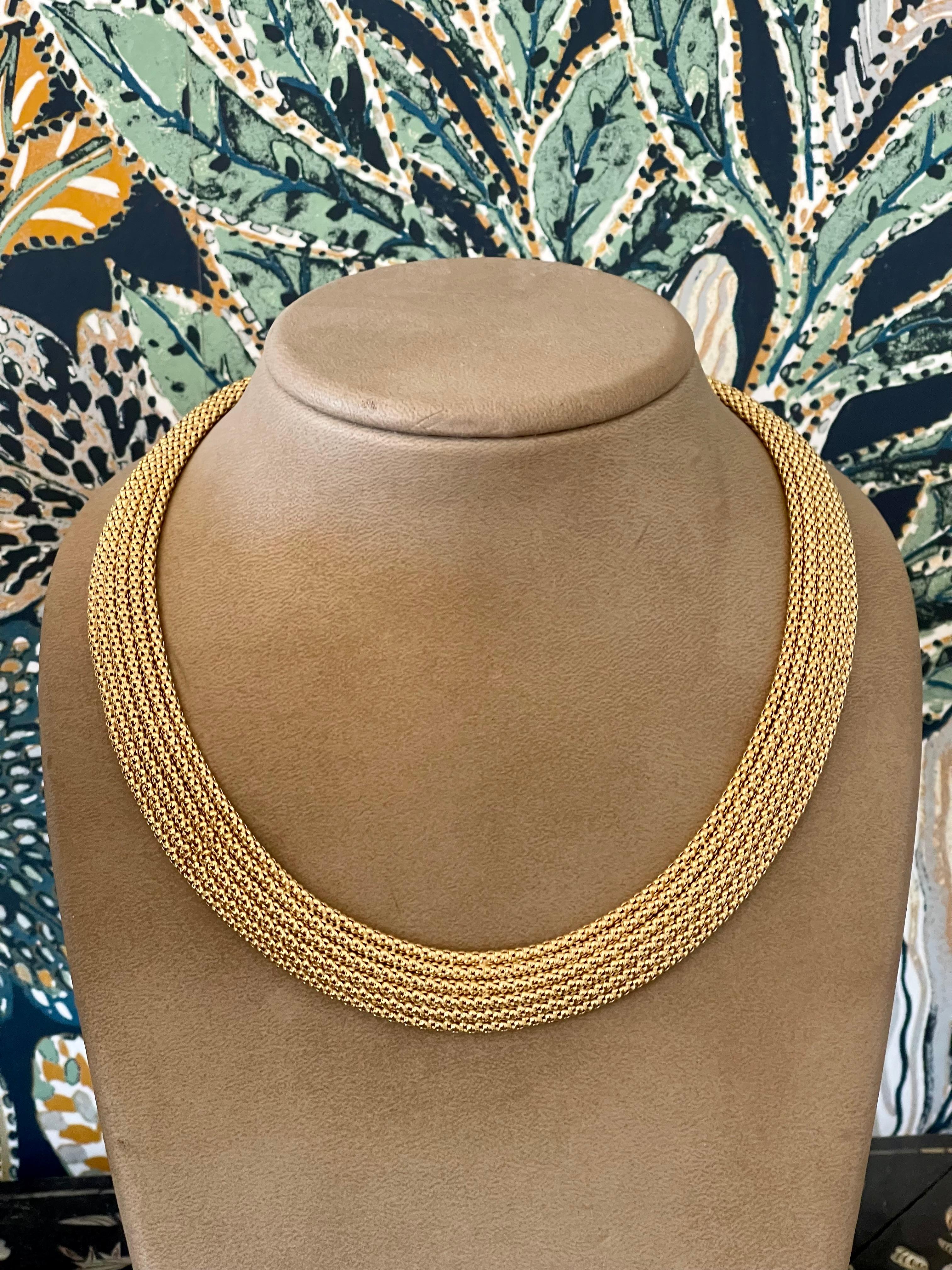 A true classic, this lovely mesh necklace is an absolute statement piece. The movement throughout the necklace is so smooth and subtle that it is easily worn without a thought, but the profile is bold and is visually just gorgeous. It was designed