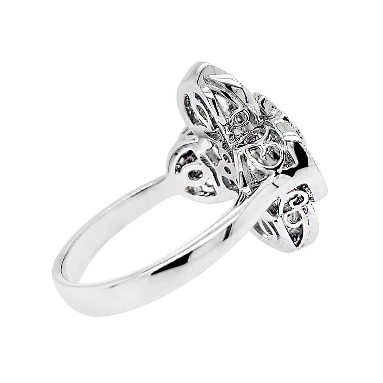 Produced by award winning Italian designer Stefano Vitolo. Stefano creates custom artisanal one of a kind jewelry with excellent gemstones in a truly old world Italian craftmanship.
This handcrafted ring has 0.46 total carat weight of F/G color and