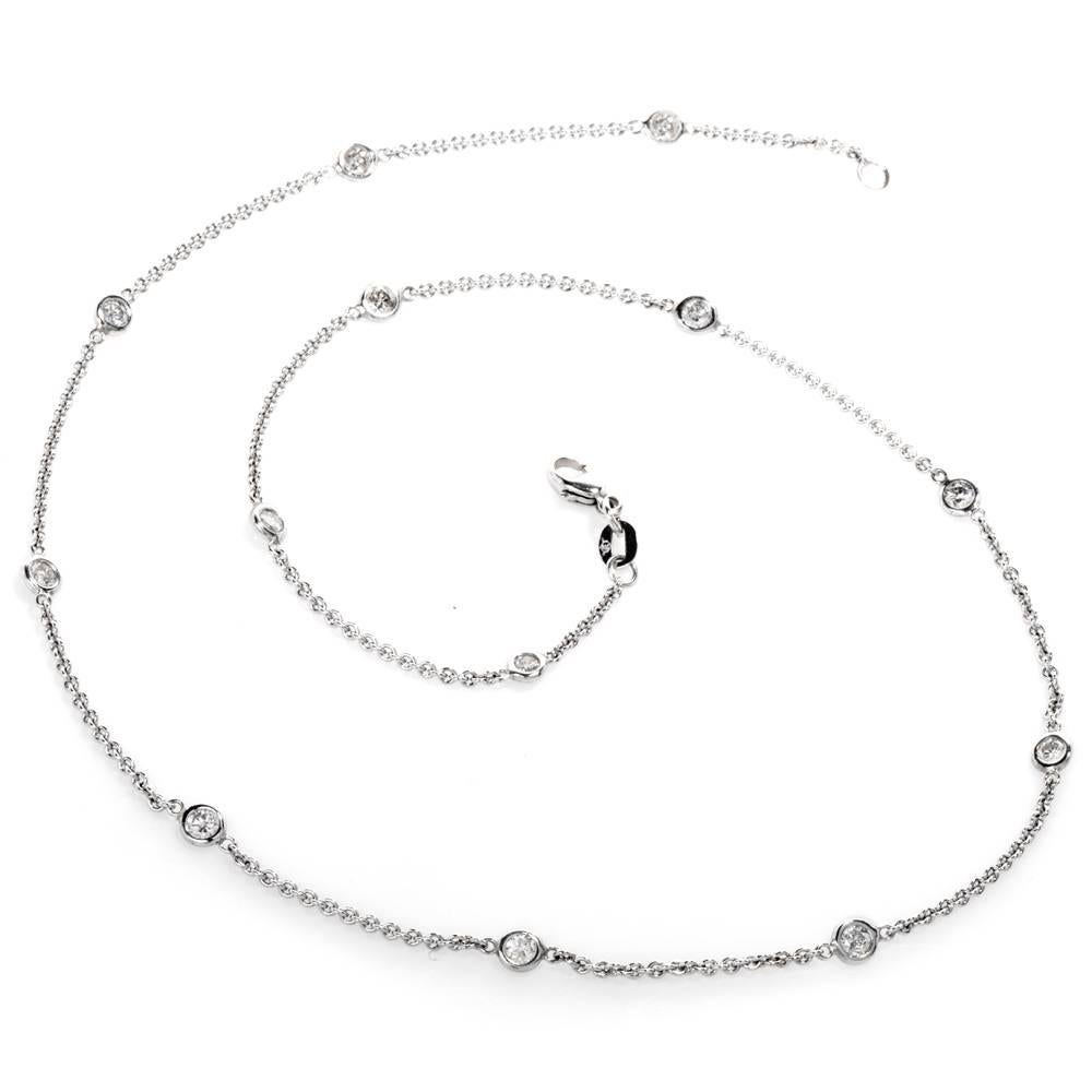 This glamorous Italian chain necklace features a “Diamond by the Yard” dazzling design crafted in solid 18K White Gold. 

It is adorned with 13 genuine round cut Diamonds of approximately 1.25 cttw, and graded G-H color, VS, SI clarity, bezel set,