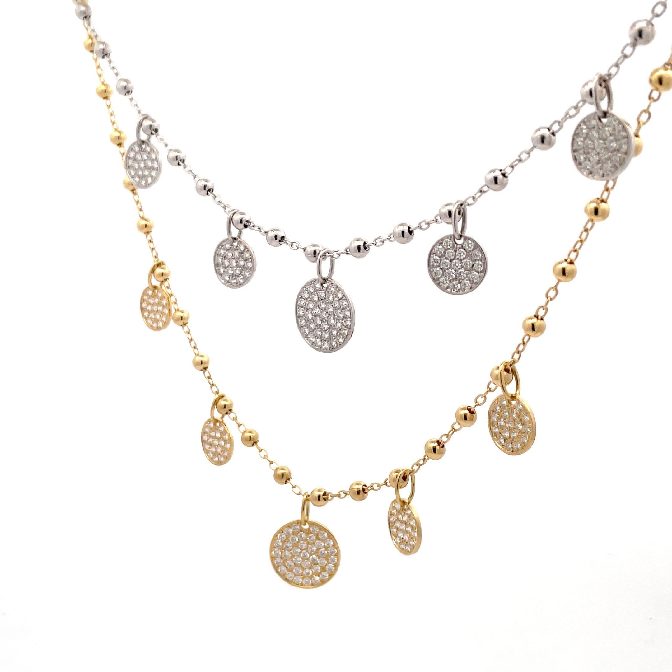 18 Karat Yellow or White Gold necklace featuring graduated diamond disc weighing 1.12 Carats on a beaded chain. 
Color F-G
Clarity SI
More Charm Necklaces Available 
Comes in white, yellow or rose.
Pirie for one necklace