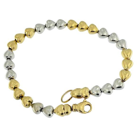 Italian 18 karat Yellow and White Gold Hearts Bracelet For Sale