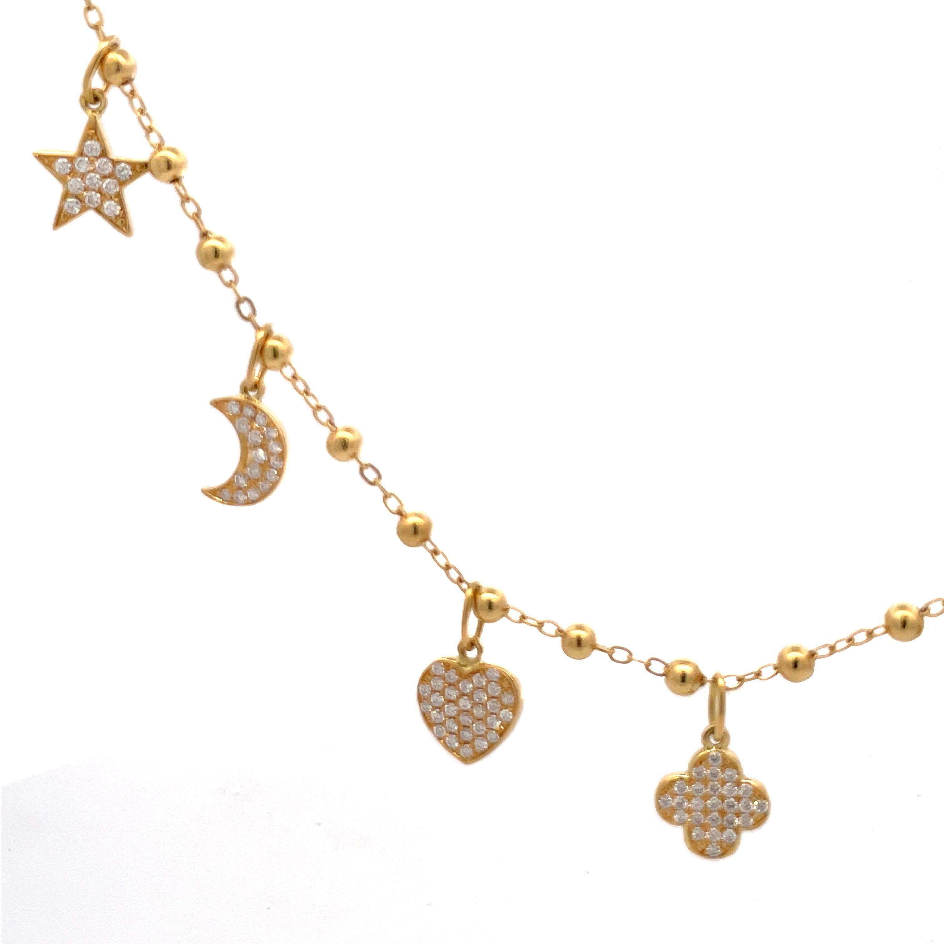 Italian, 18 Karat yellow gold necklace featuring 2 Stars, 2 Moons, 2 Hearts and a Clover center on a link & beaded chain.
Charms are 0.38 inches 
Diamond weight .1.32 Carats
Can come in white or rose gold.