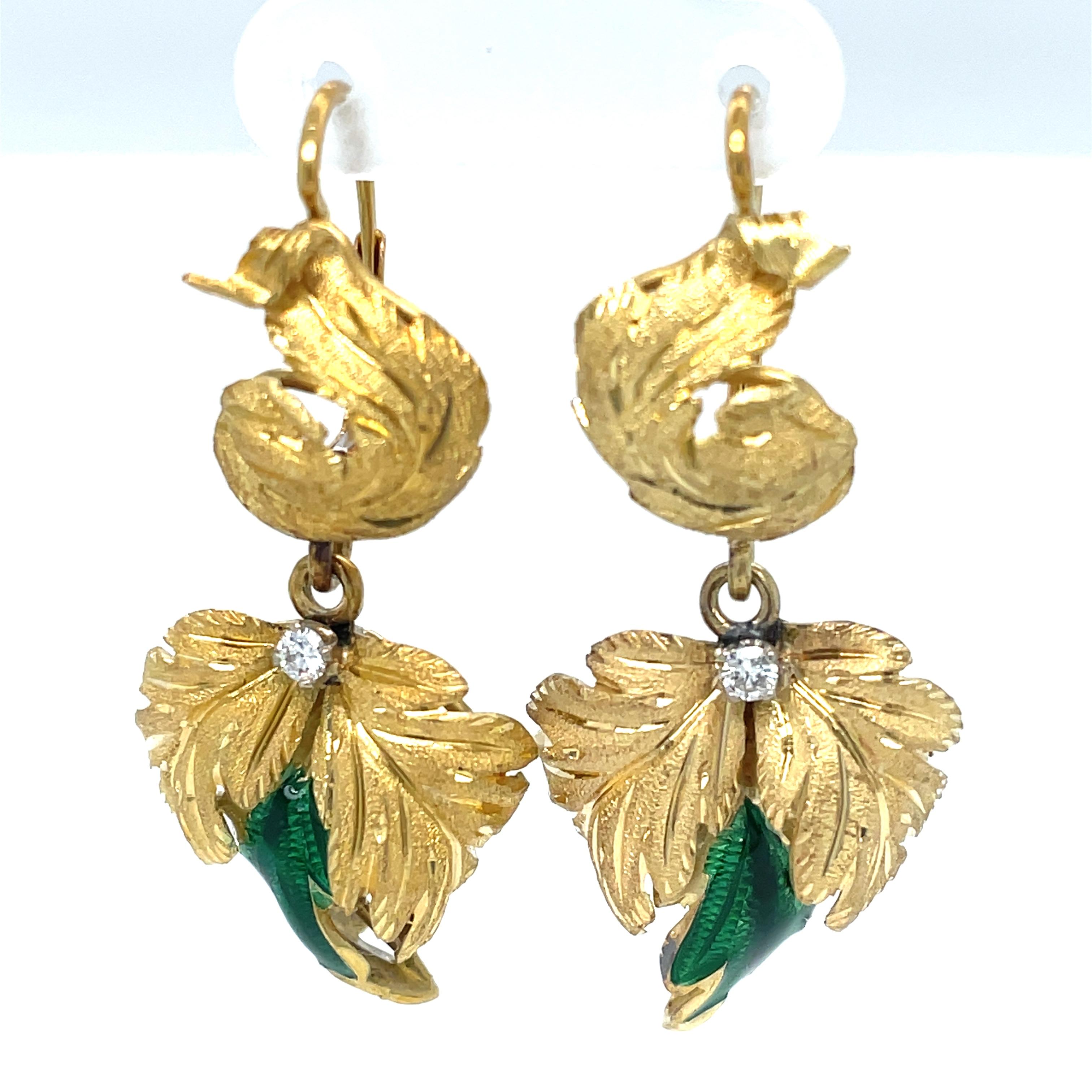 Italian artistry in gold is shown by the notable fine details that create this botanical inspired vintage earring pair. Texturing techniques in 18 karat gold give definition, dimension and shine to the leaf cluster design that is further highlighted