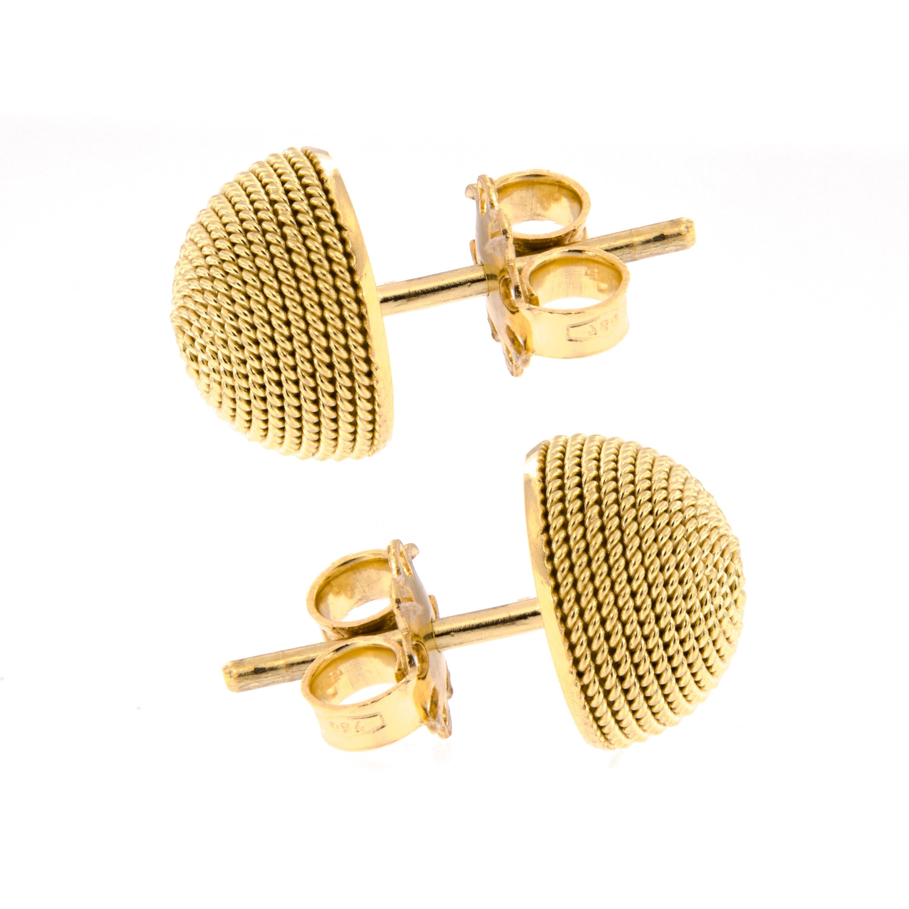 Classic post earrings with a nautical flair. Earrings are beautifully crafted in 18k yellow gold. Weigh 4.2 grams. 10mm in diameter.