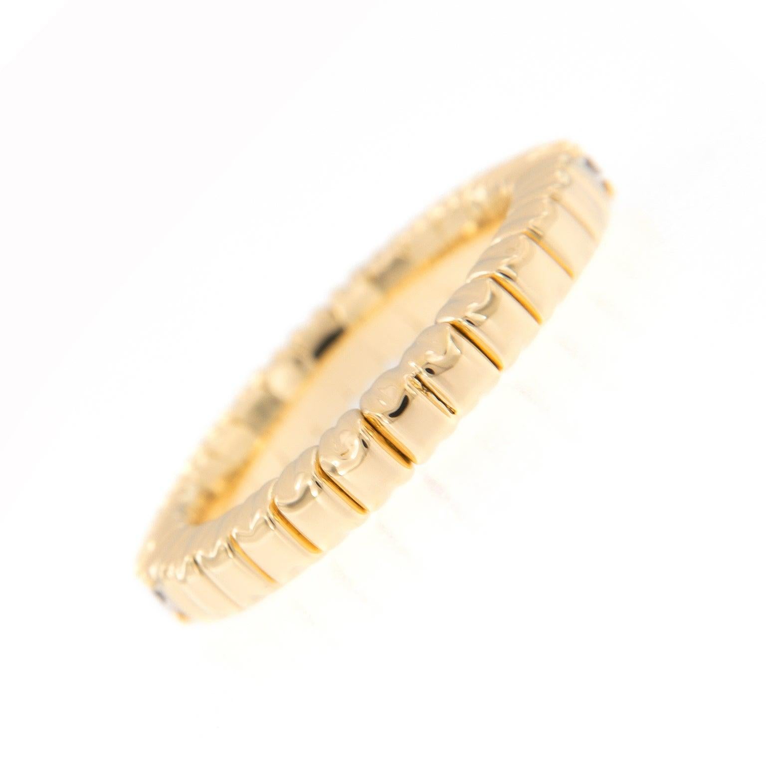 Made in Italy for Campanelli & Pear this beautiful stretchable diamond band ring is designed for comfort and perfectly fits one’s finger. It evens works on those with larger knuckles! The ring is crafted in 18k yellow gold and features 17 round