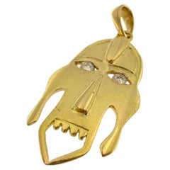 Italian 18 karat Yellow Gold Tribal Pendant with Diamonds
