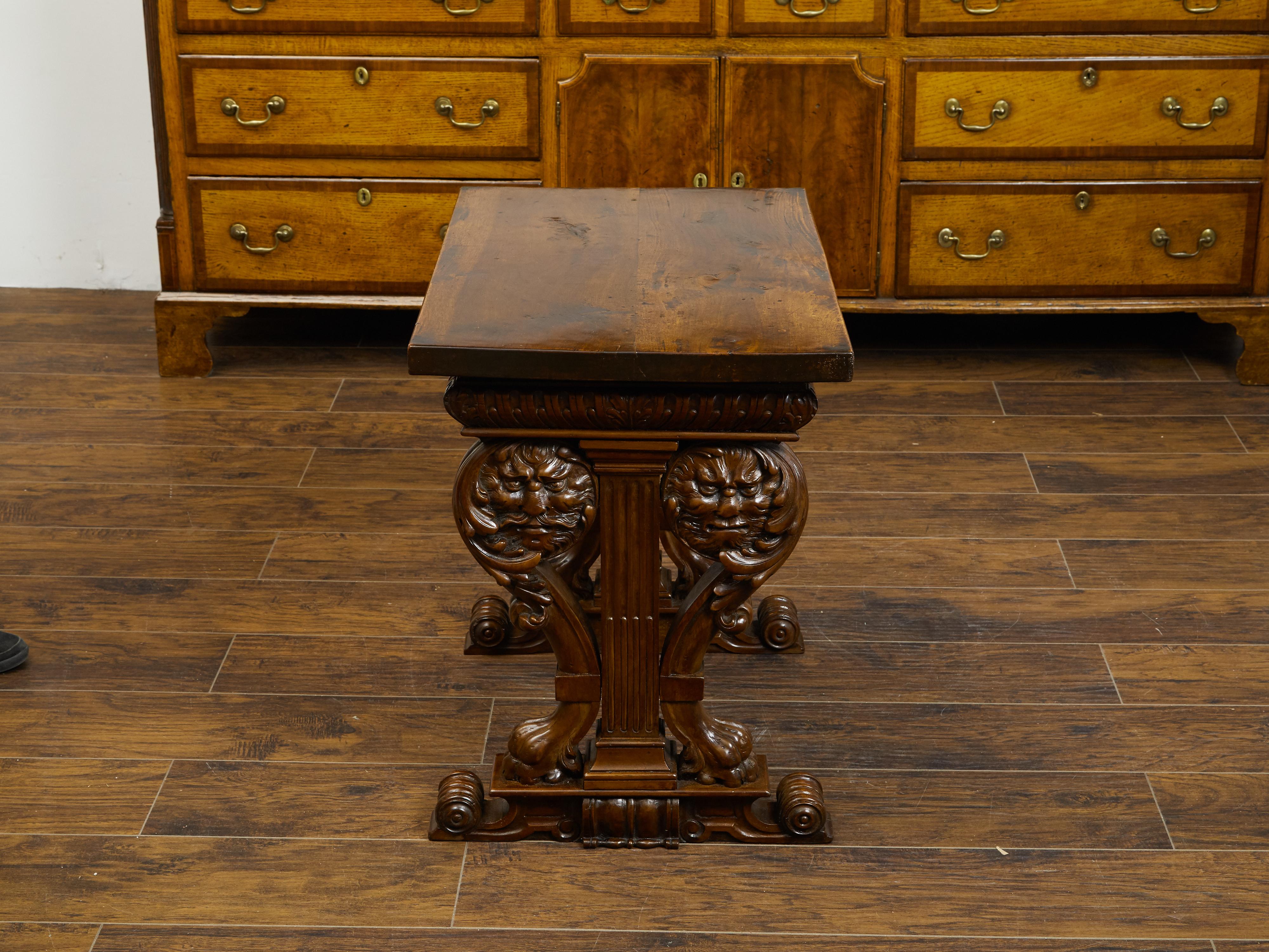 Italian 1800s Walnut Side Table with Lion Motifs and Richly Carved Trestle Base For Sale 7