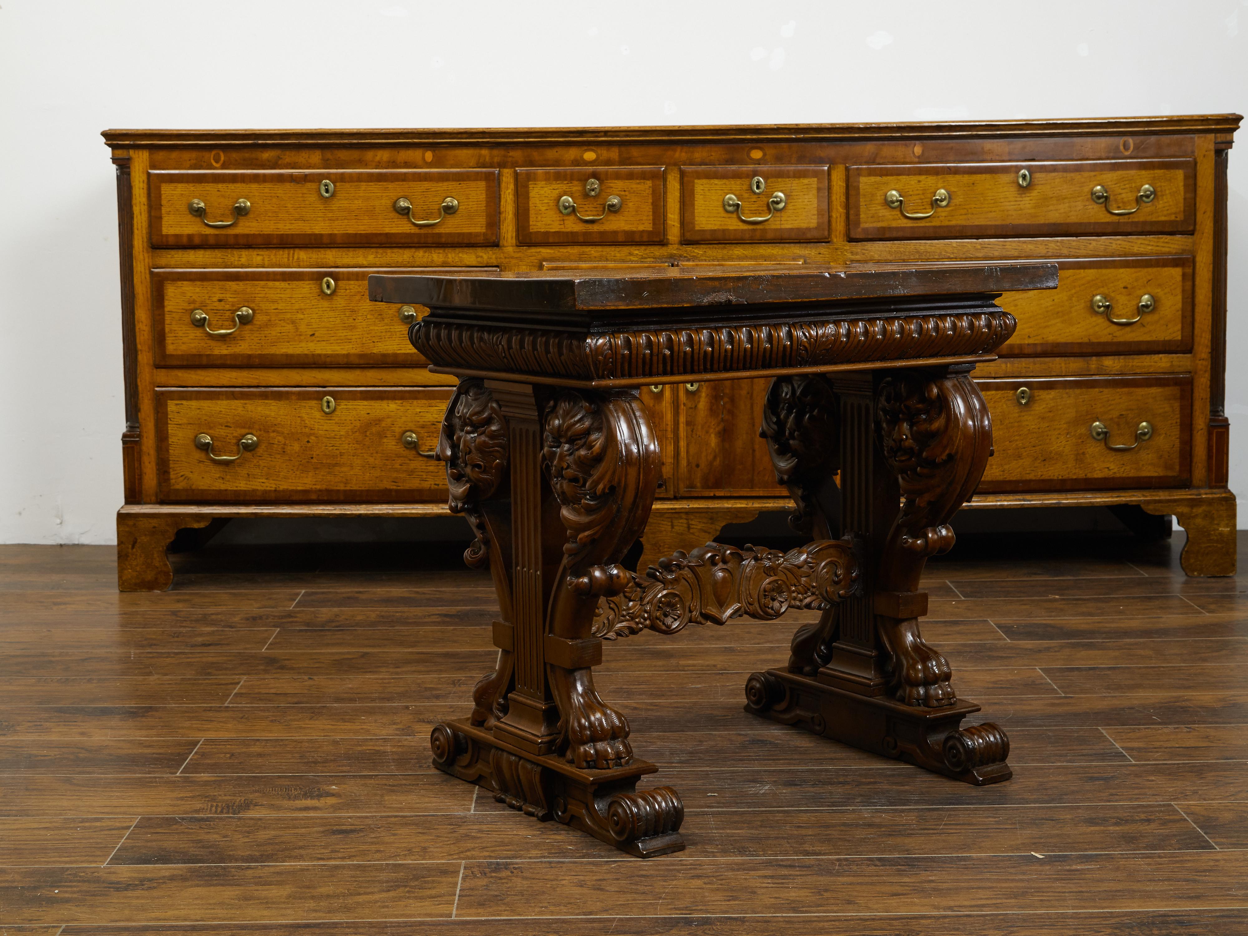 Italian 1800s Walnut Side Table with Lion Motifs and Richly Carved Trestle Base For Sale 3