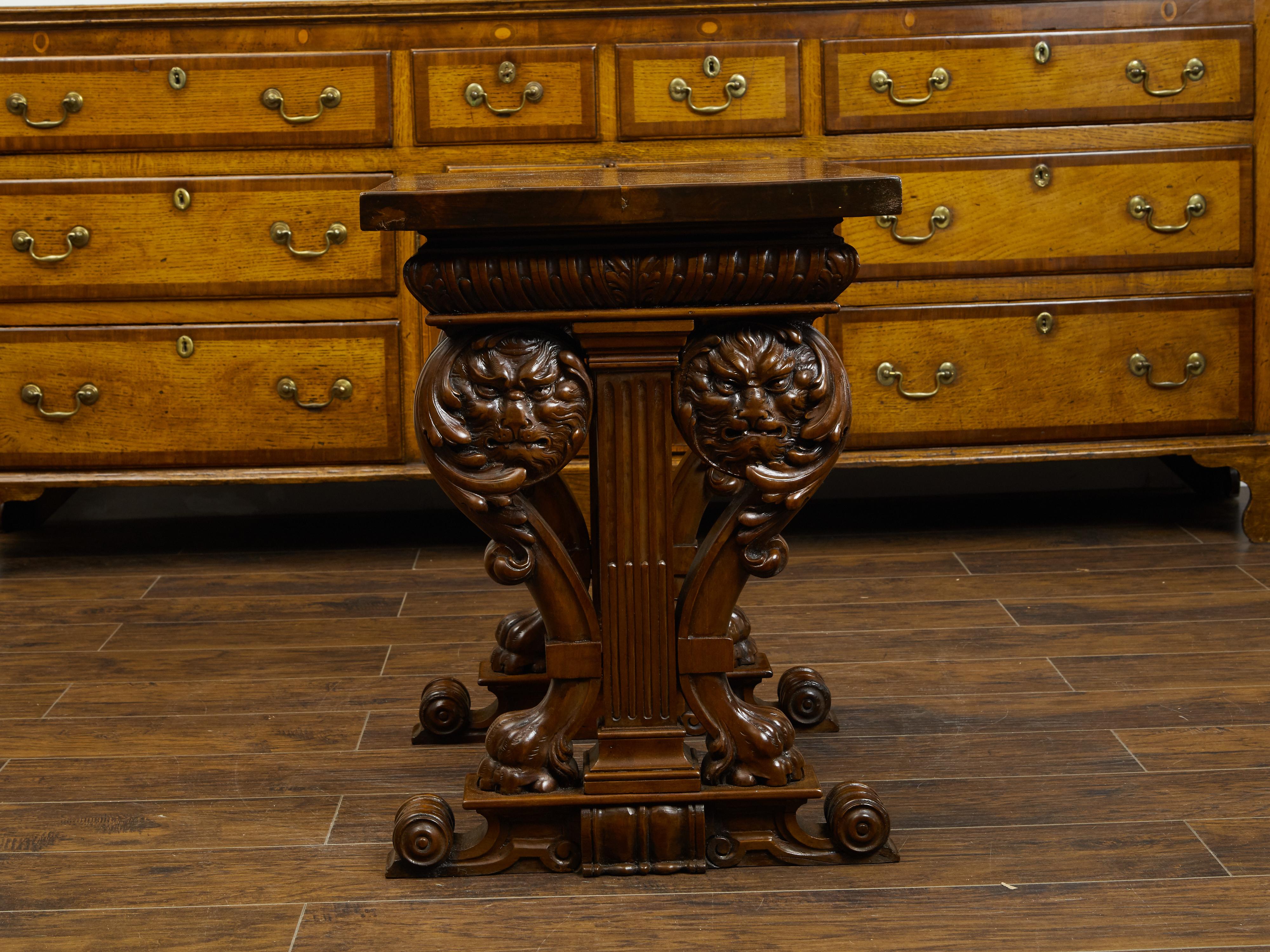 Italian 1800s Walnut Side Table with Lion Motifs and Richly Carved Trestle Base For Sale 4