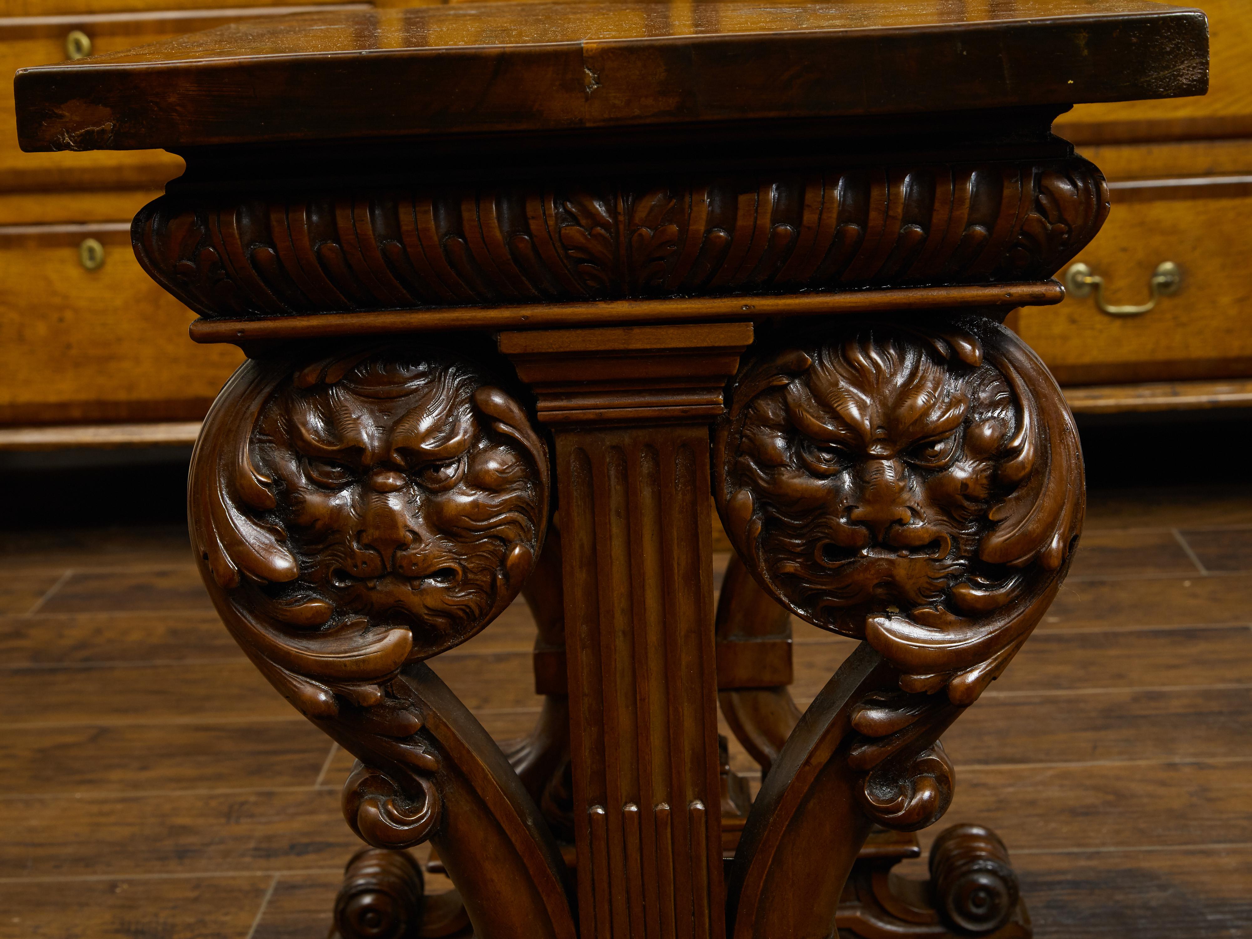 Italian 1800s Walnut Side Table with Lion Motifs and Richly Carved Trestle Base For Sale 5