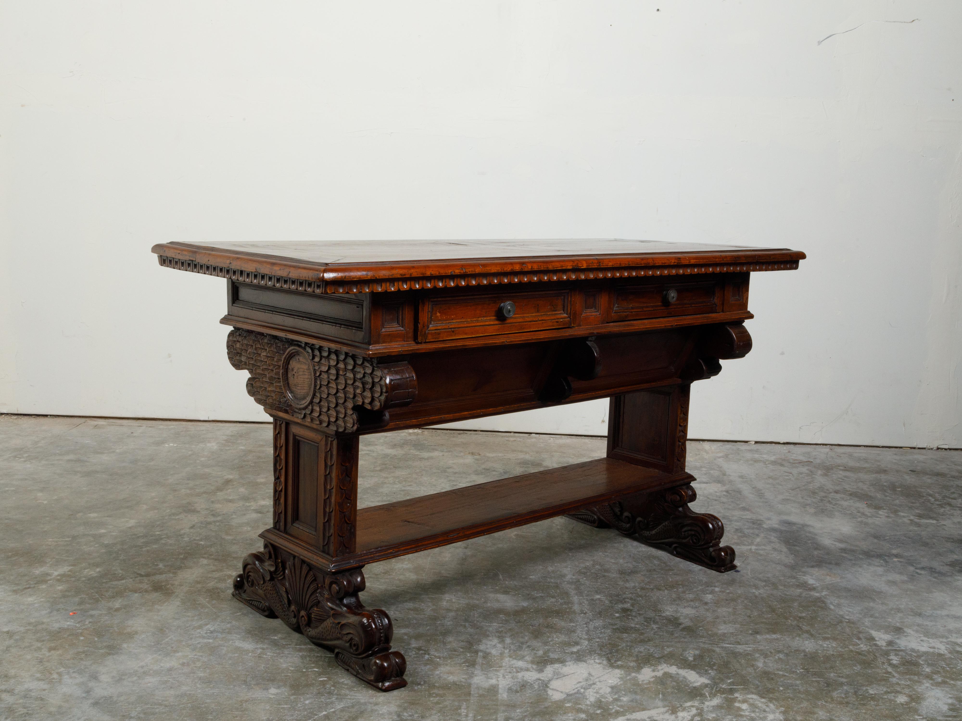 19th Century Italian 1800s Walnut Trestle Base Table with Two Drawers and Carved Motifs For Sale