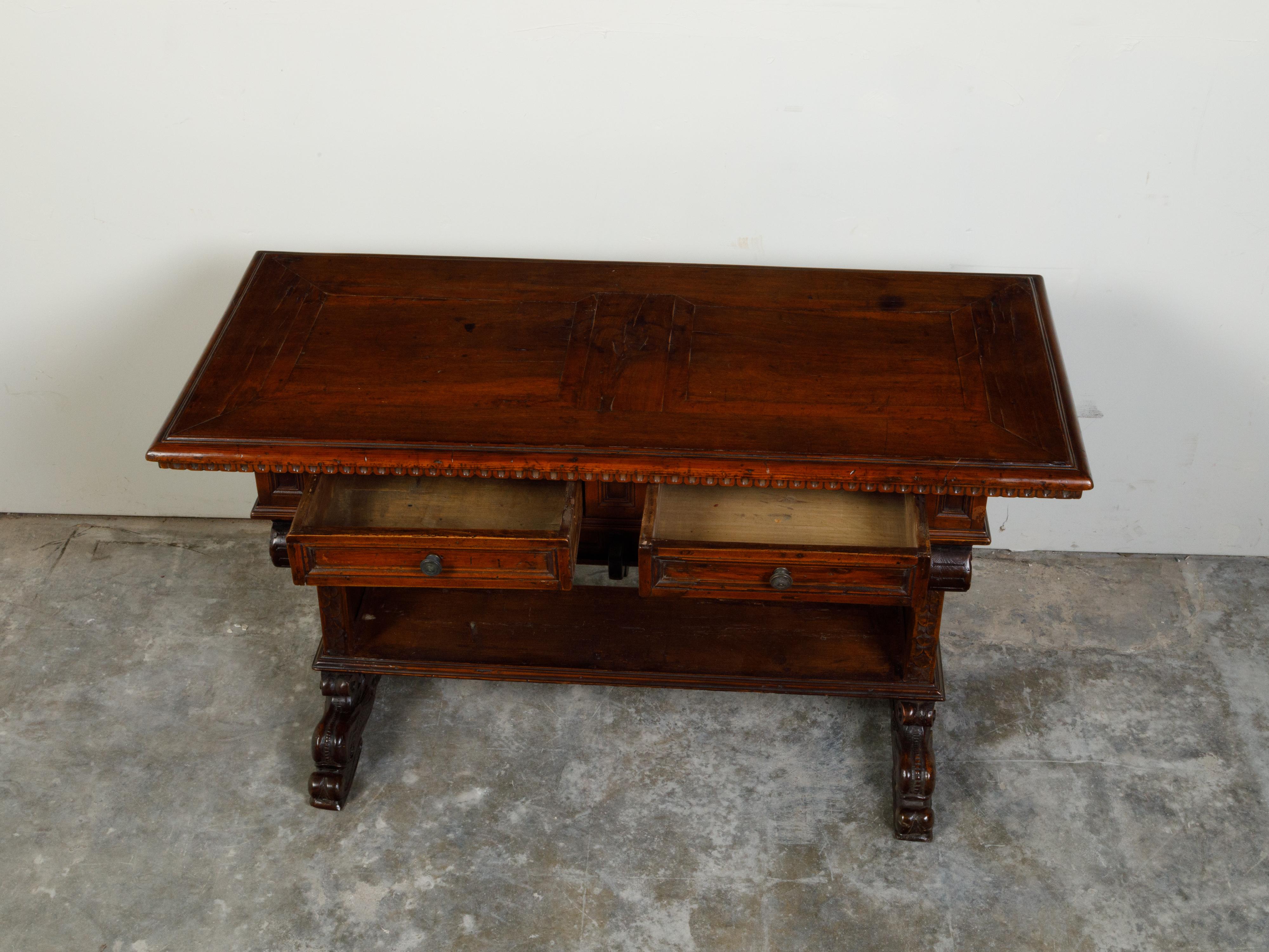 Italian 1800s Walnut Trestle Base Table with Two Drawers and Carved Motifs For Sale 1