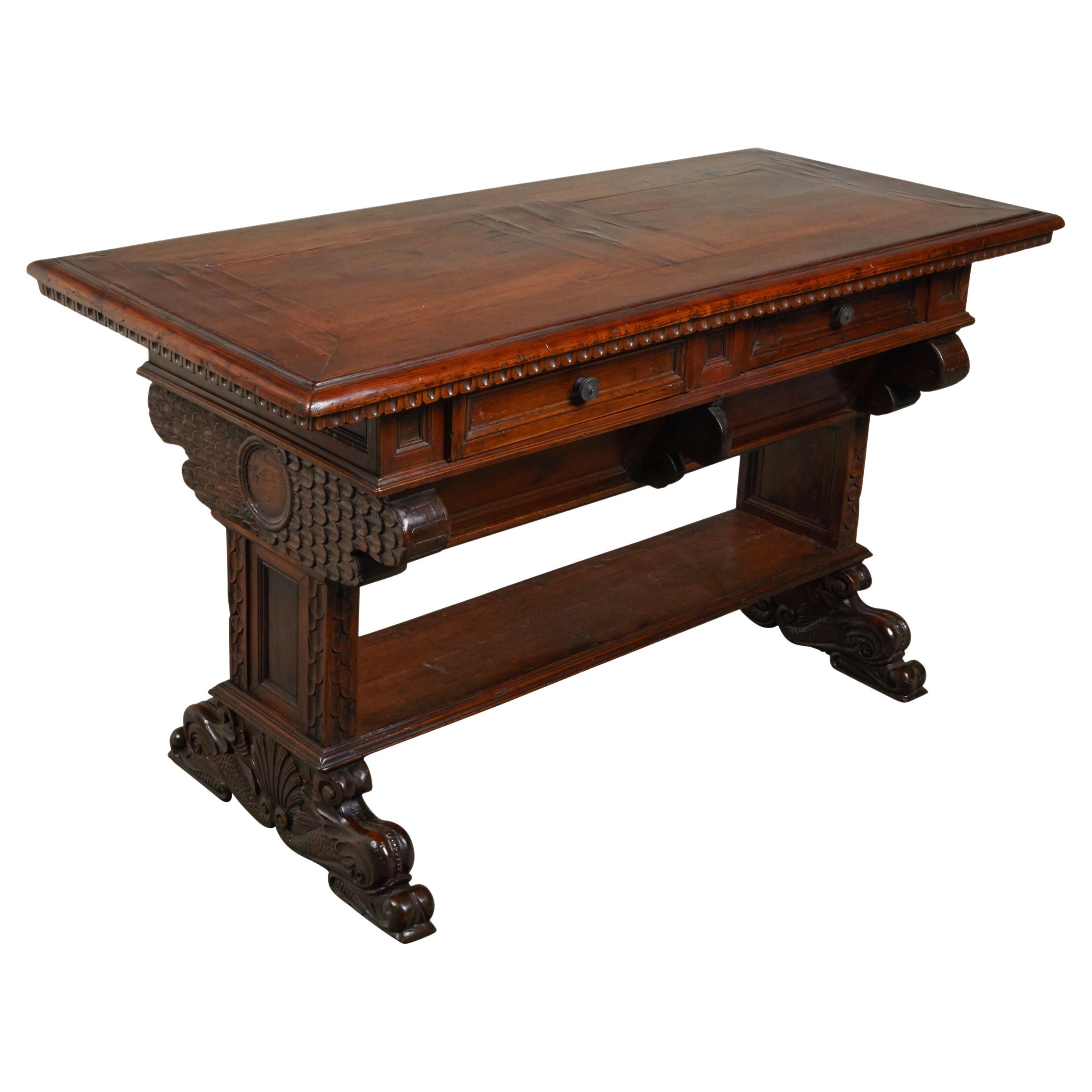 Italian 1800s Walnut Trestle Base Table with Two Drawers and Carved Motifs For Sale