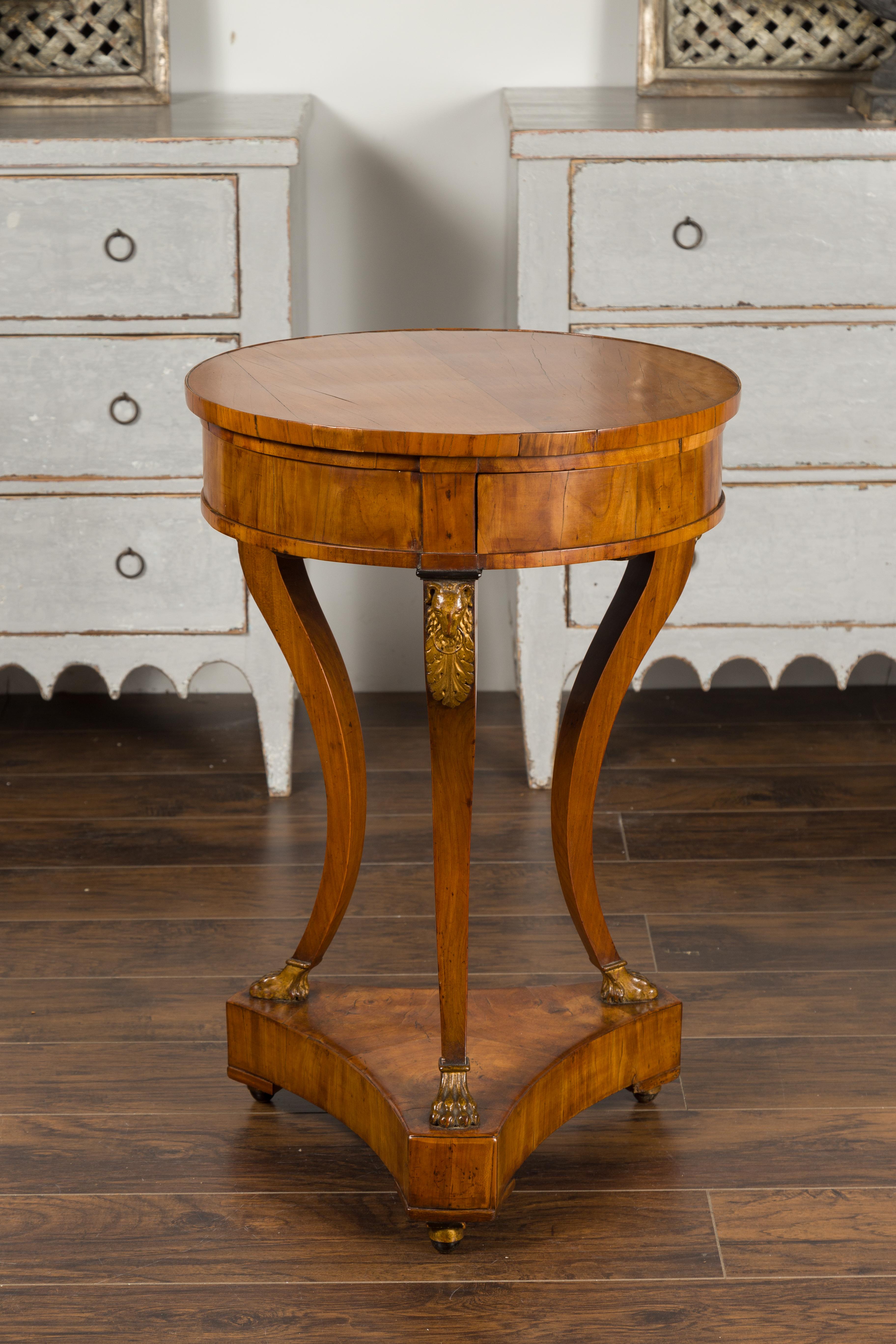 Italian 1820s Empire Walnut Guéridon Table with Three Drawers and Rams' Heads For Sale 4