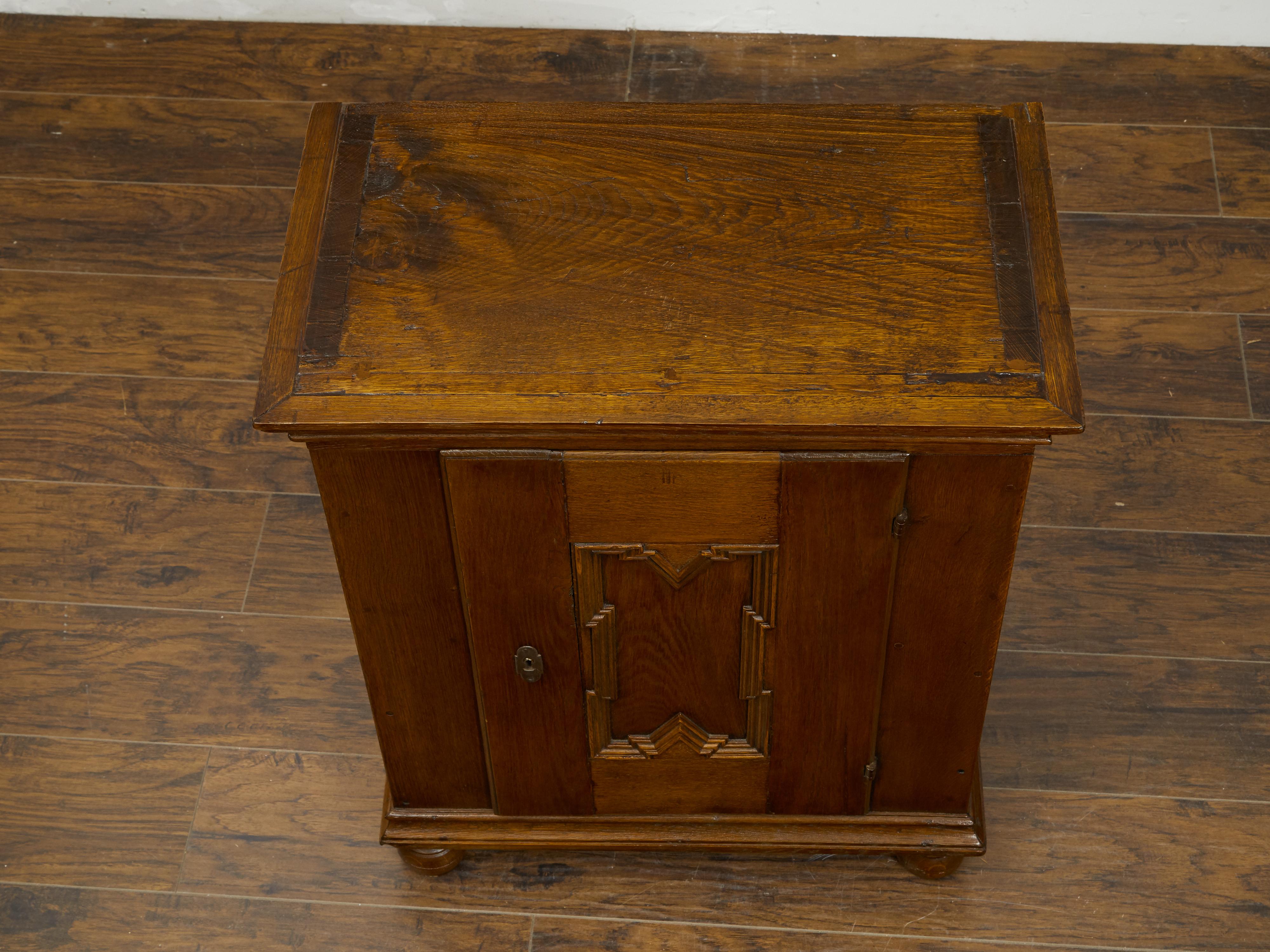 small oak cabinet with doors
