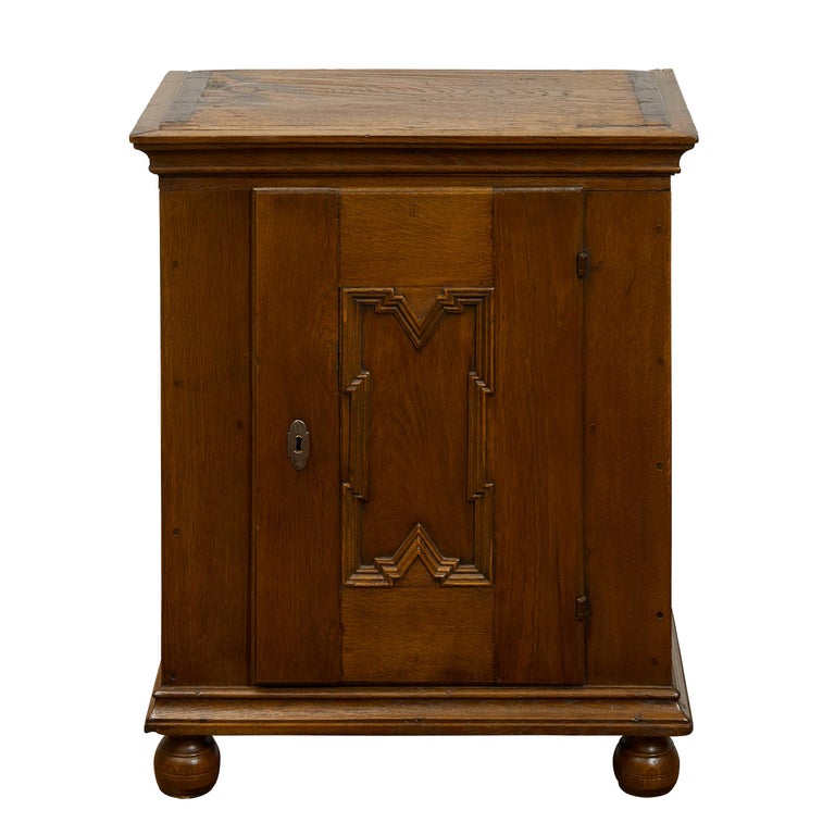 Italian 1820s Small Oak with Single Door and Geometric Carved