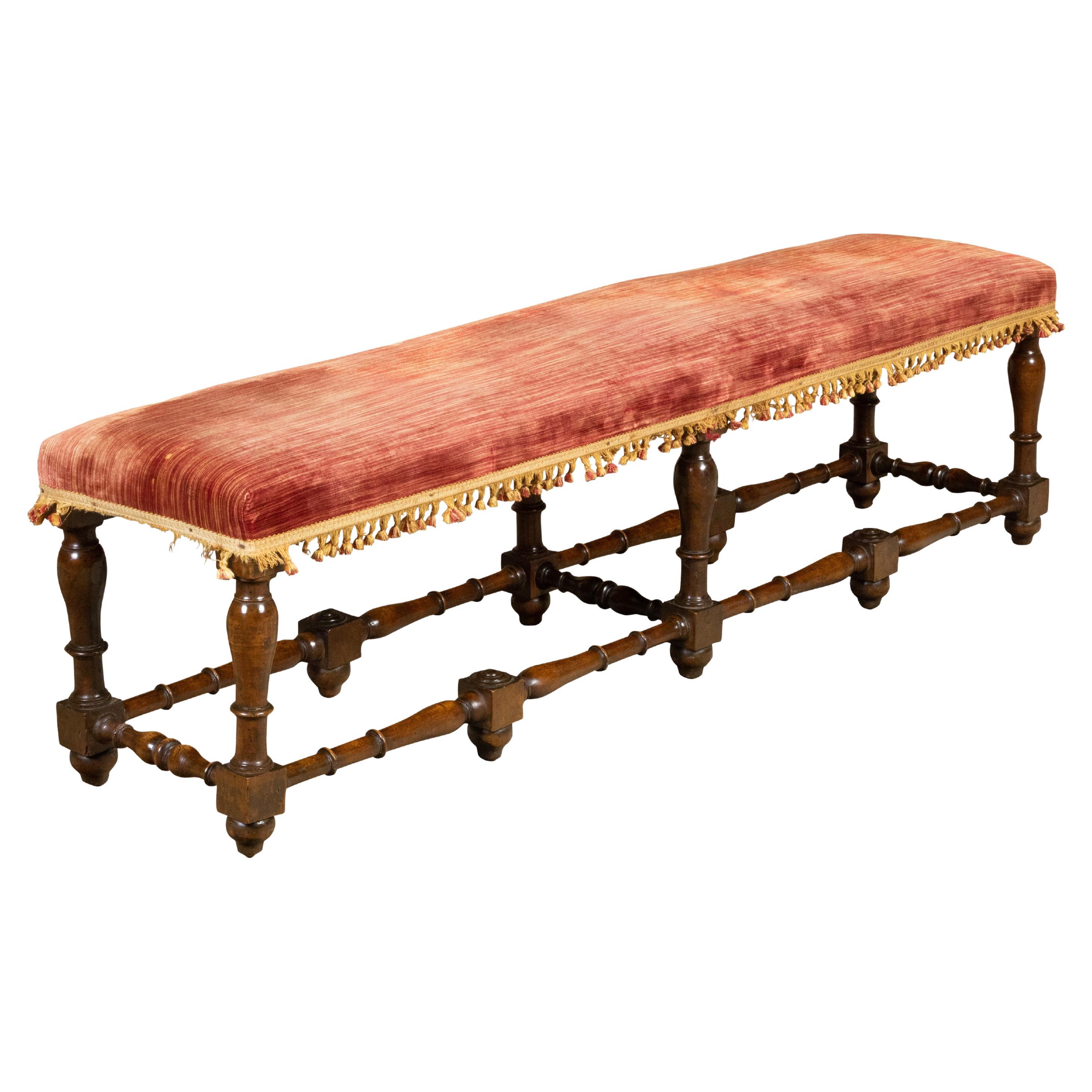 Italian 1820s Walnut Bench with Red Fabric, Turned Legs and Stretchers For Sale
