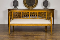 Italian 1820s Walnut Settee with Pierced Back, X Motifs and Gilded Medallions
