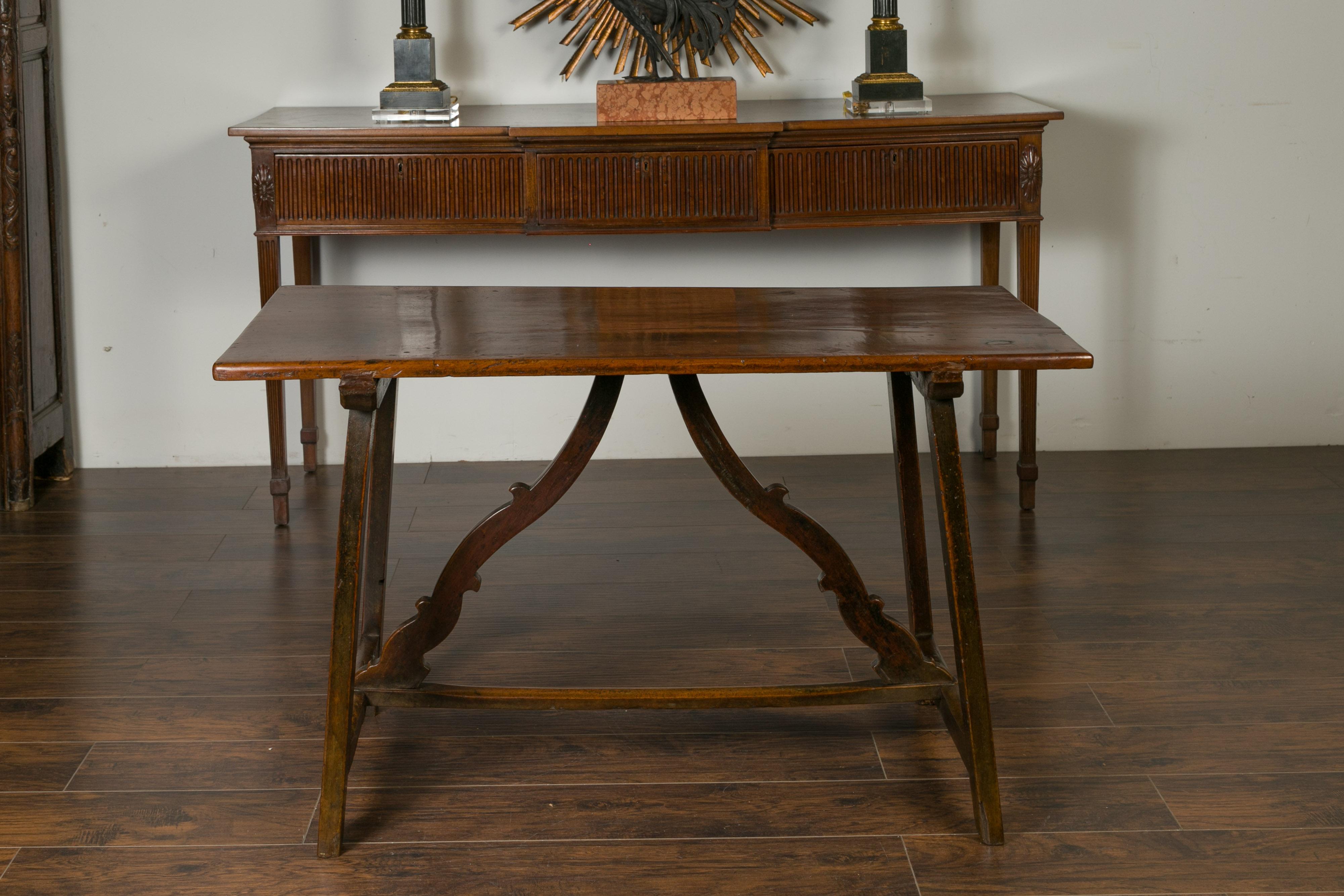 Italian 1820s Walnut Trestle Base Console Table with Carved Scrolling Stretchers In Good Condition For Sale In Atlanta, GA