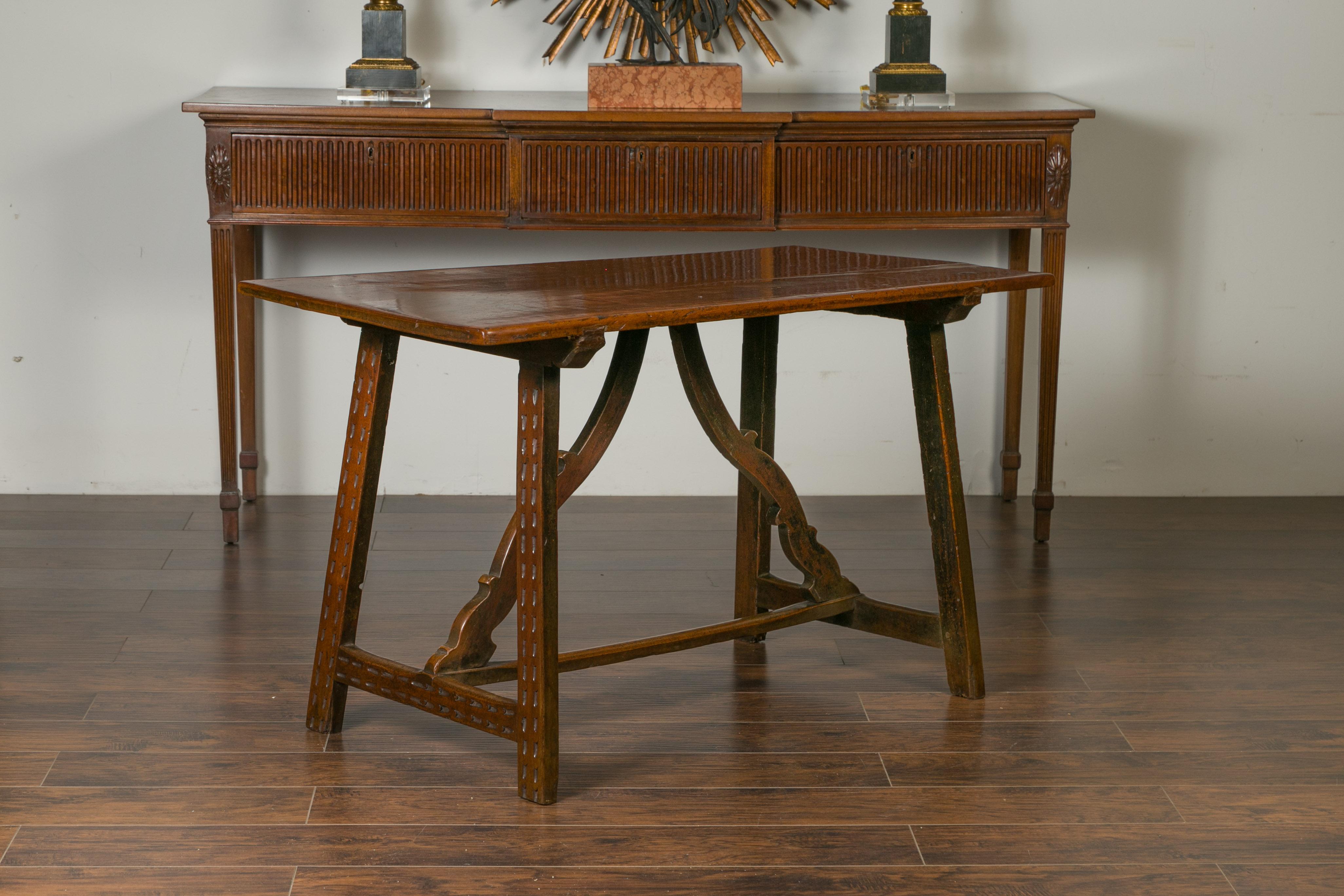 19th Century Italian 1820s Walnut Trestle Base Console Table with Carved Scrolling Stretchers For Sale
