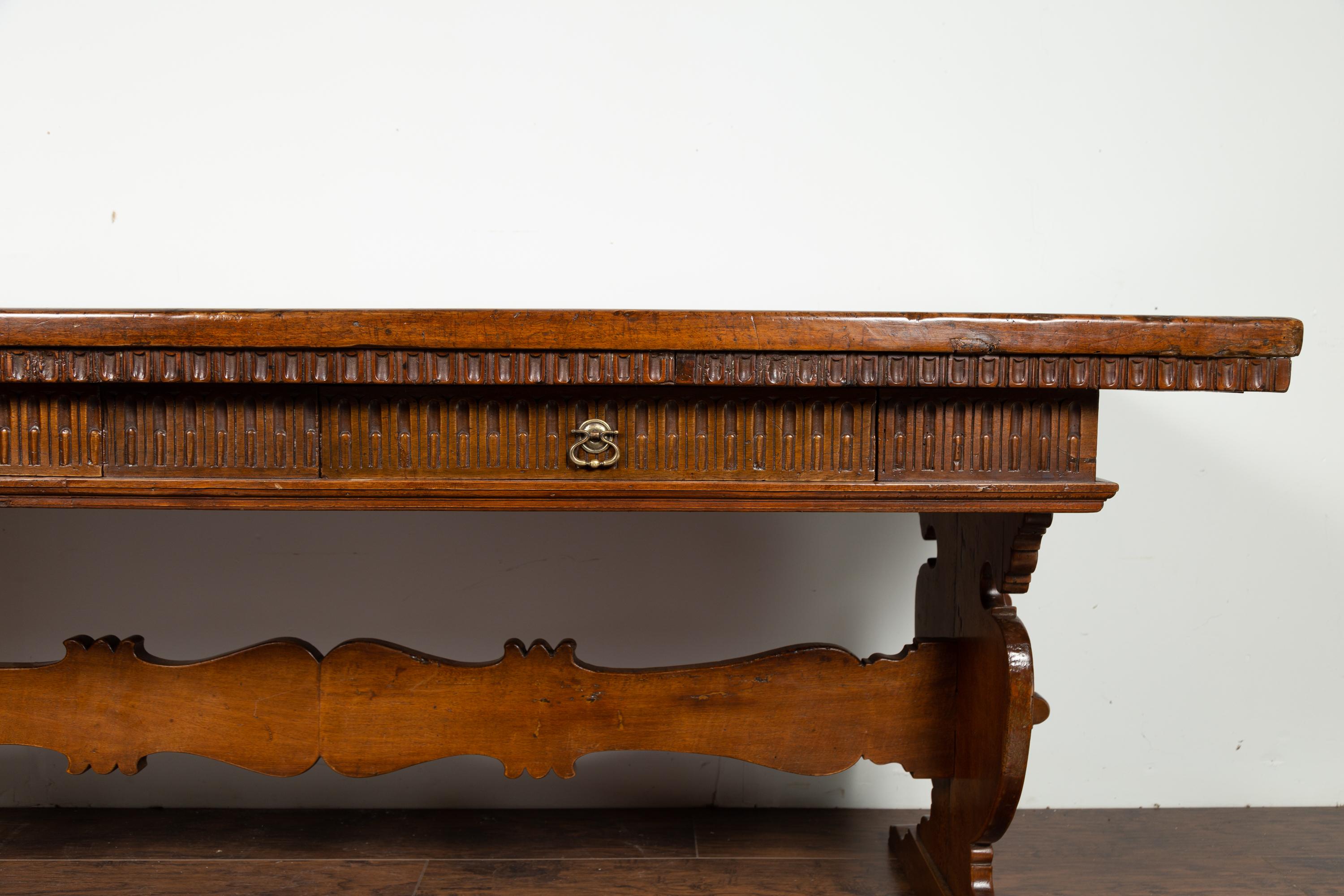 Italian 1840s Walnut Trestle Table with Two Drawers and Fluted Accents 1