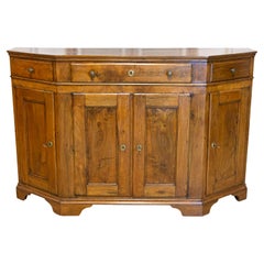 Italienische Nussbaum-Credenza von 1850 mit schrägen Seiten, drei Schubladen über vier Türen