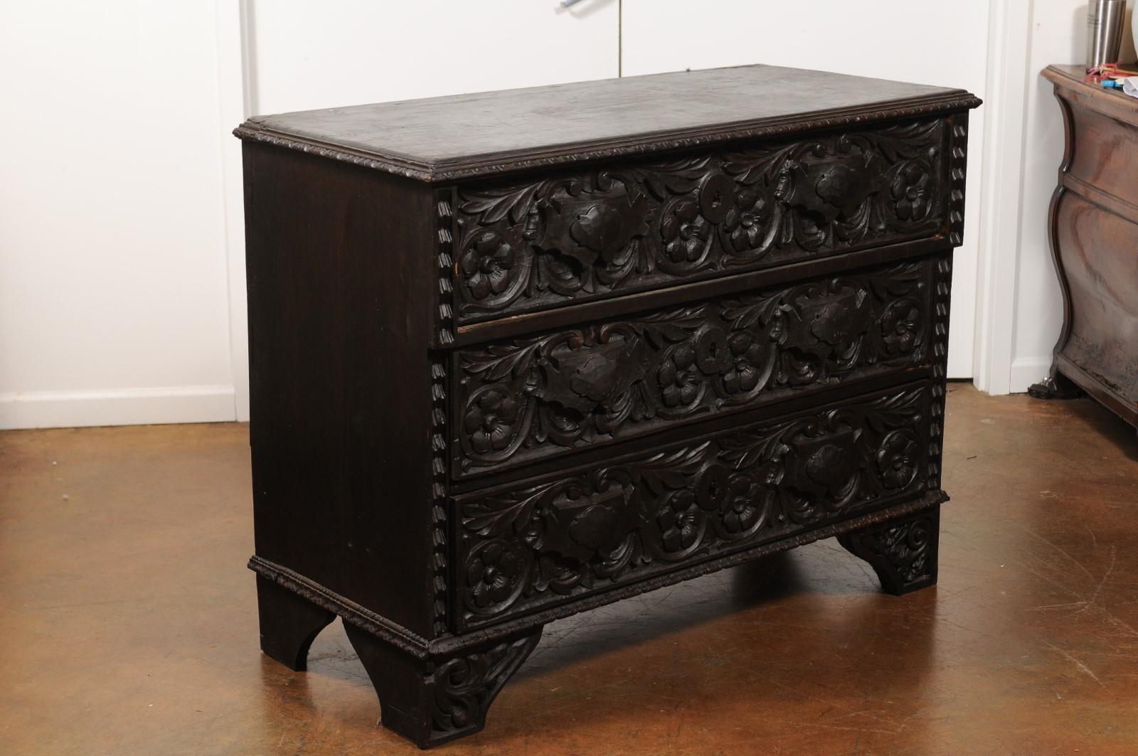 Wood Italian 1860s Three-Drawer Commode with Hand-Carved Scrollwork and Dark Patina