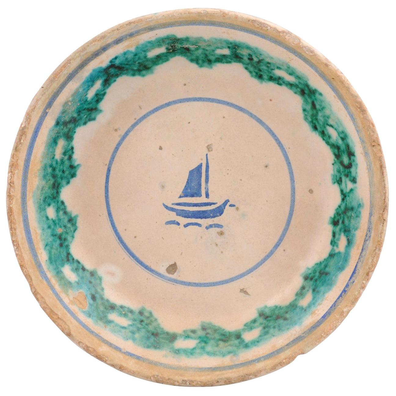 Italian 1895 Pottery Platter with Blue Sailboat Motif and Weathered Patina